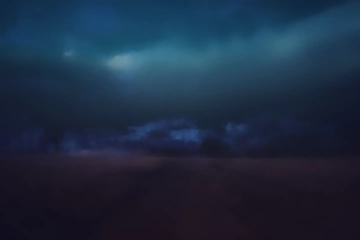 Dark, cloudy sky with a stormy atmosphere and faint ground visible below.