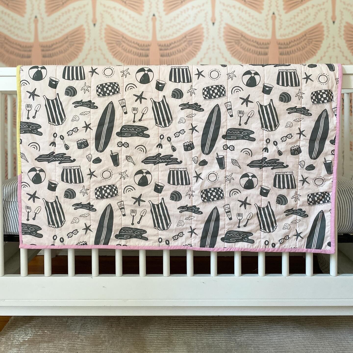 Baby quilts! I wanted to make something special for my nephew for his first birthday, so I designed surf-inspired fabric to match his room, then quilted it into a crib quilt. Then, decided to make a second, pink version for my daughter&rsquo;s first 