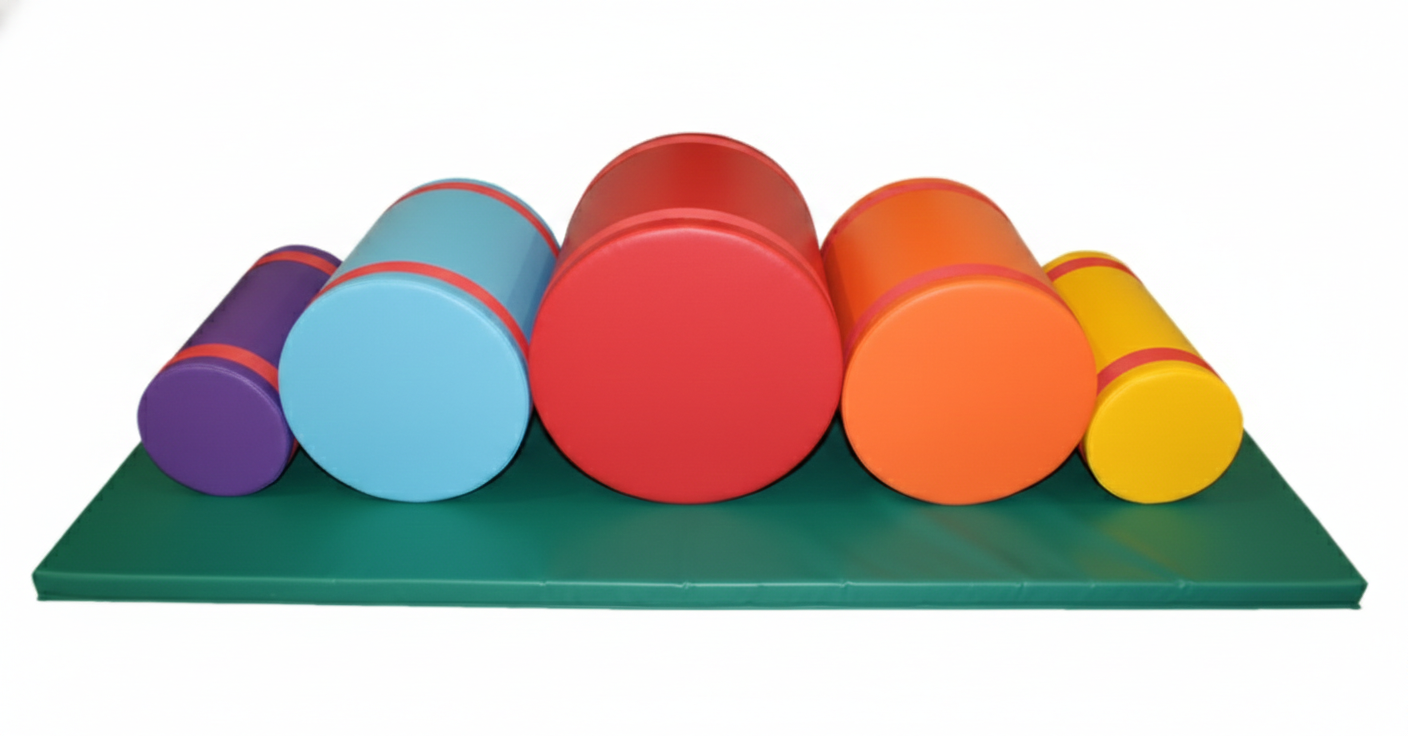 Colorful foam cylindrical stepping stones arranged on a green mat.