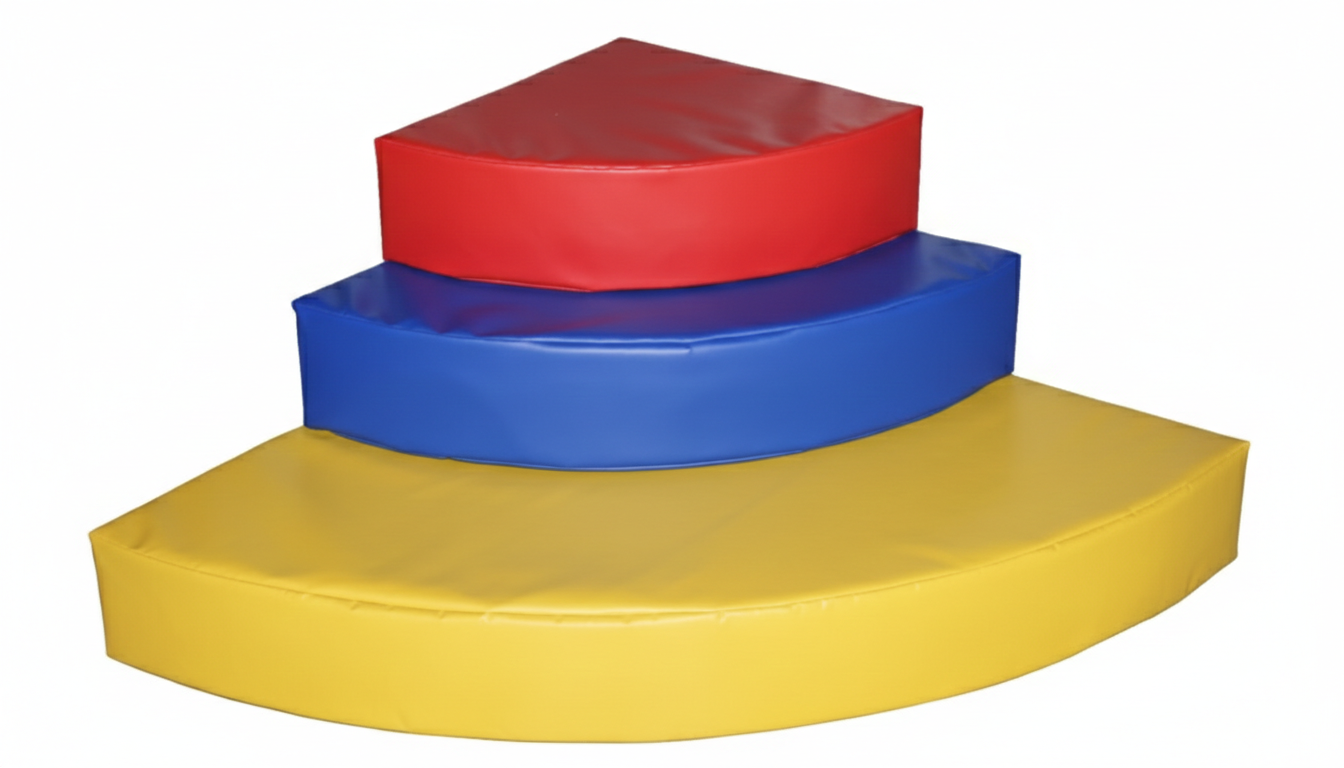 Colorful padded stepping blocks stacked in a staircase pattern, with yellow at the bottom, blue in the middle, and red at the top.