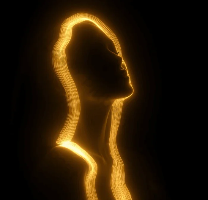 Sequoia555 radiant-female-silhouette-with-golden-light-streaks.webp