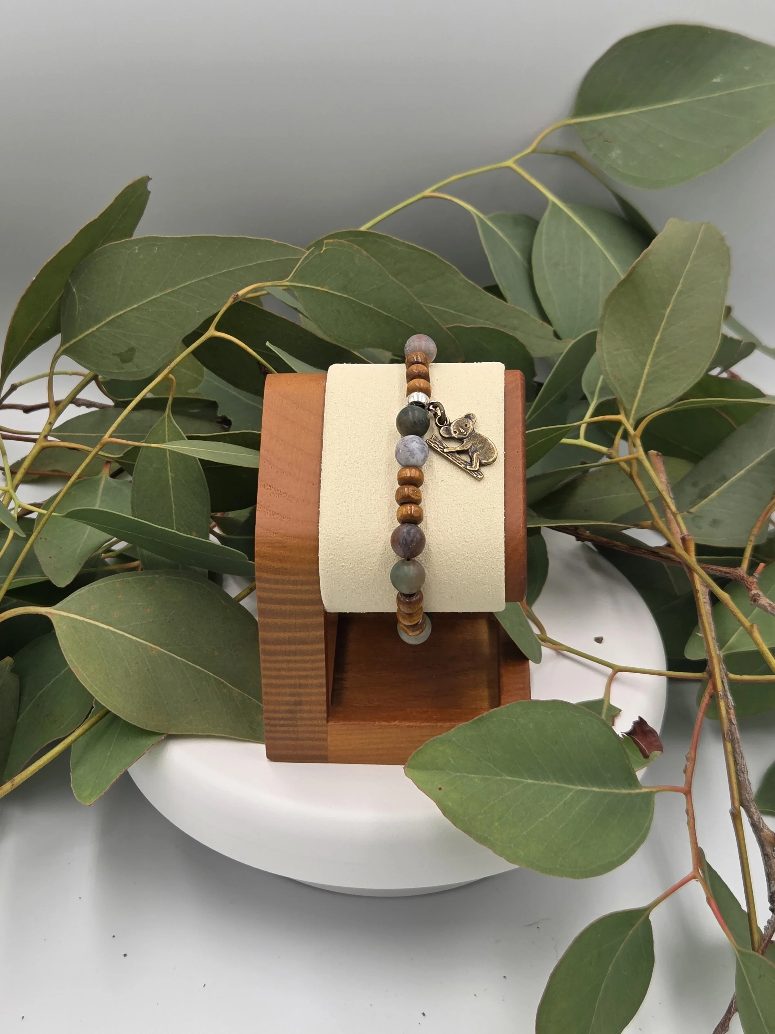 OOAK Indian Agate and wood disc bracelet with bronze koala charm on gum leaves.