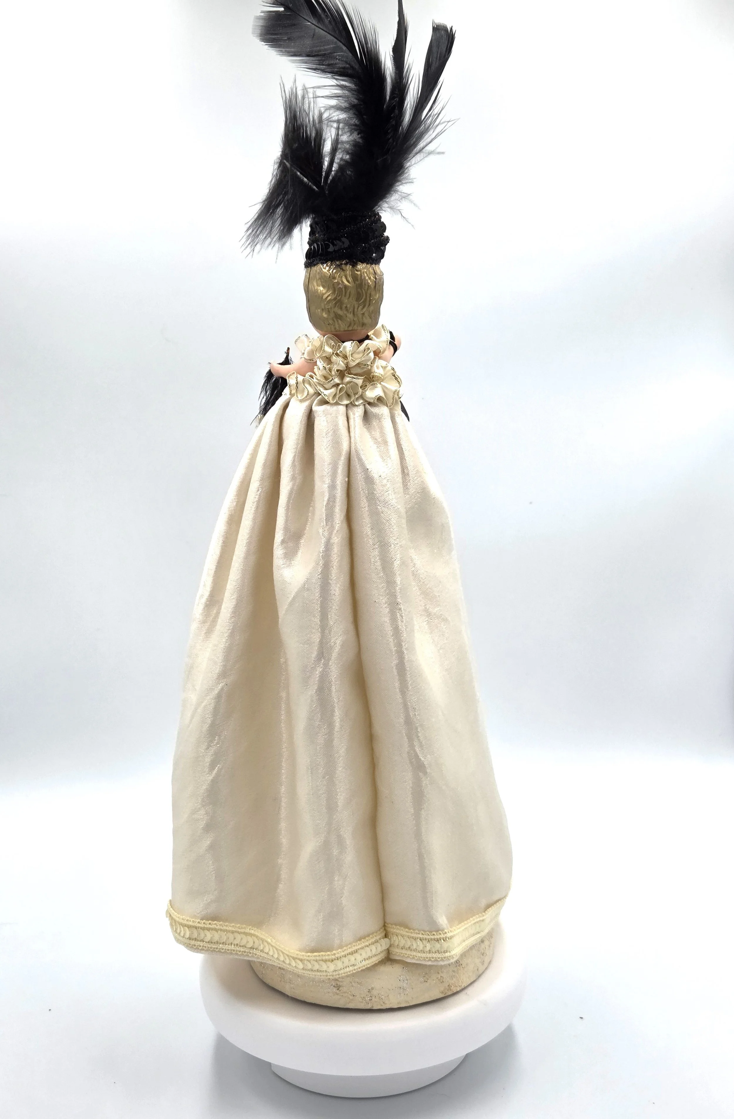 back view Sabina Art Doll Black and ivory themed doll with feathers, sequins and dangling beads