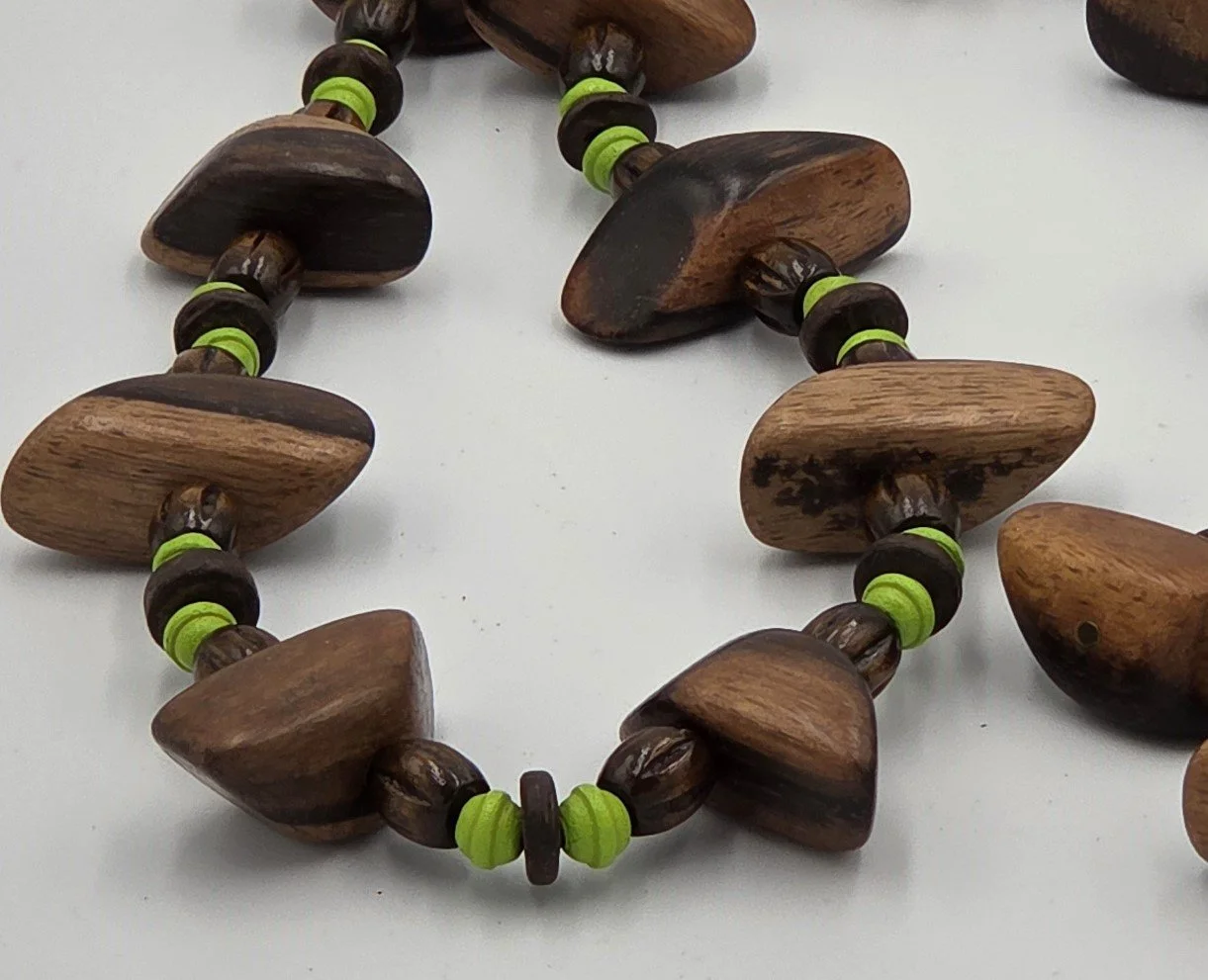 close up of Long brown and lime green OOAK wooden bead necklace