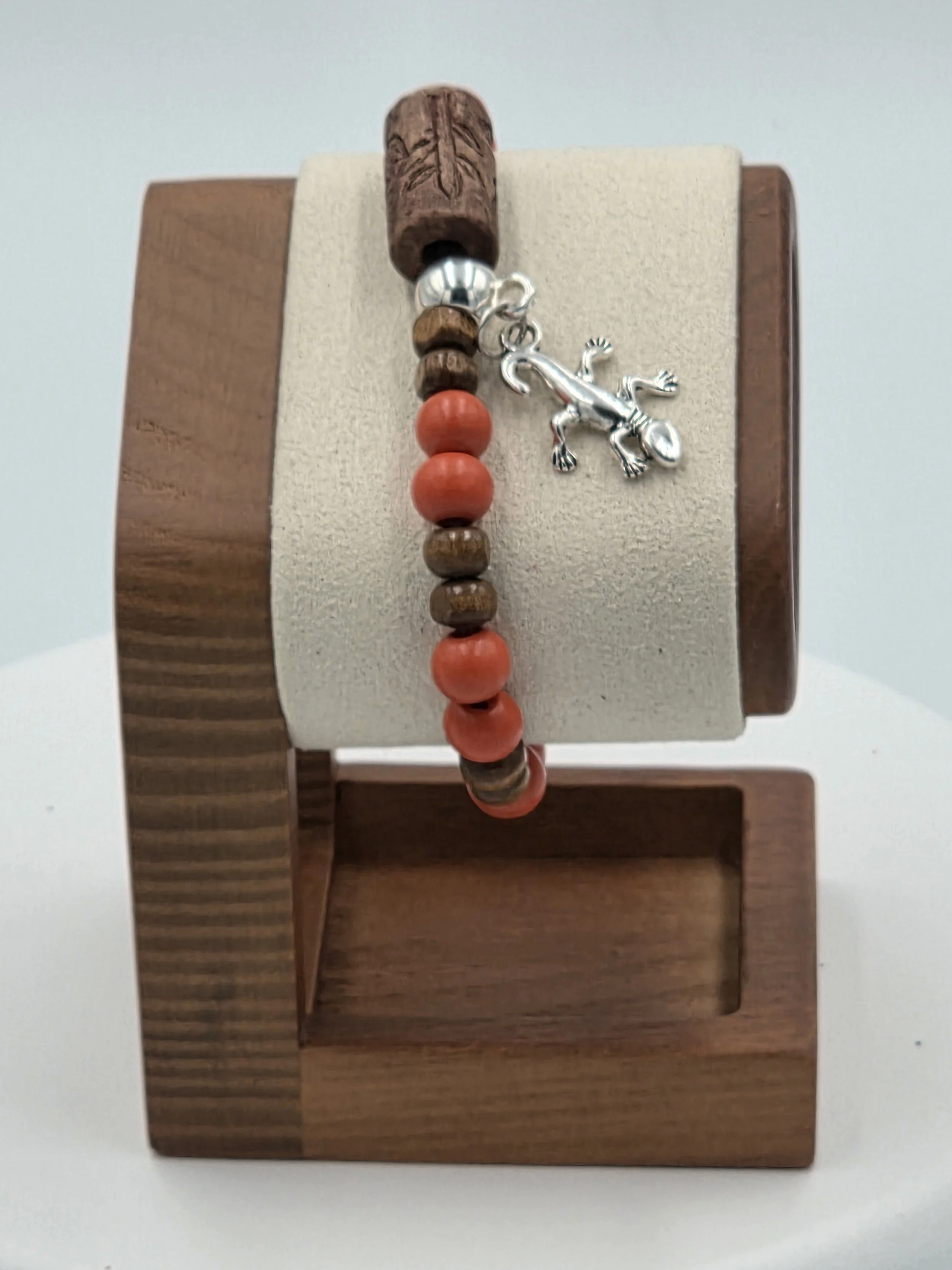 OOAK red and tan wood bracelet with ceramic log bead and silver gecko.
