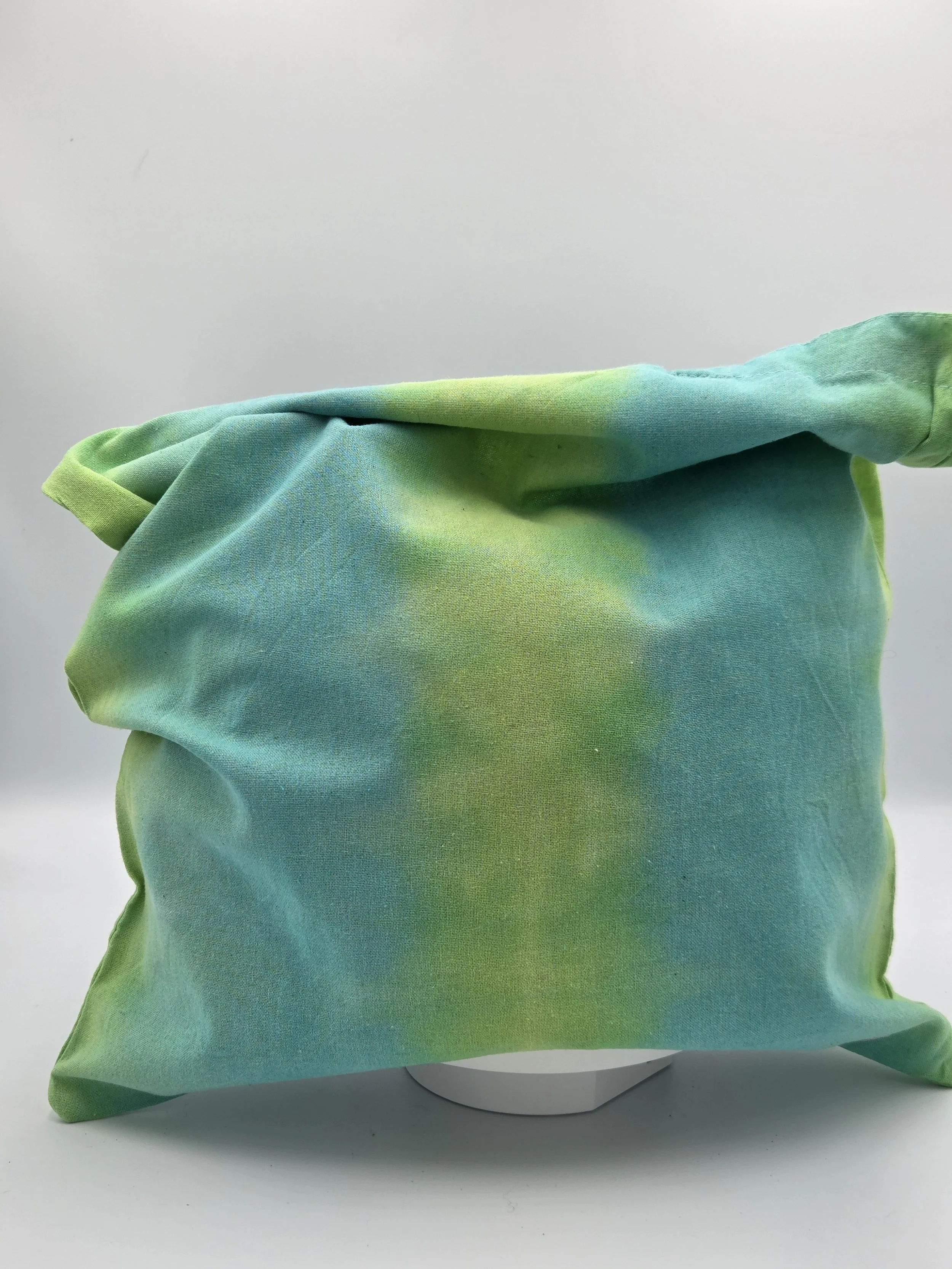 "Artisan handmade tote bag featuring wide vertical stripes of lime green and teal. Eco-friendly 100% cotton shopper by Livity and the Creative i."