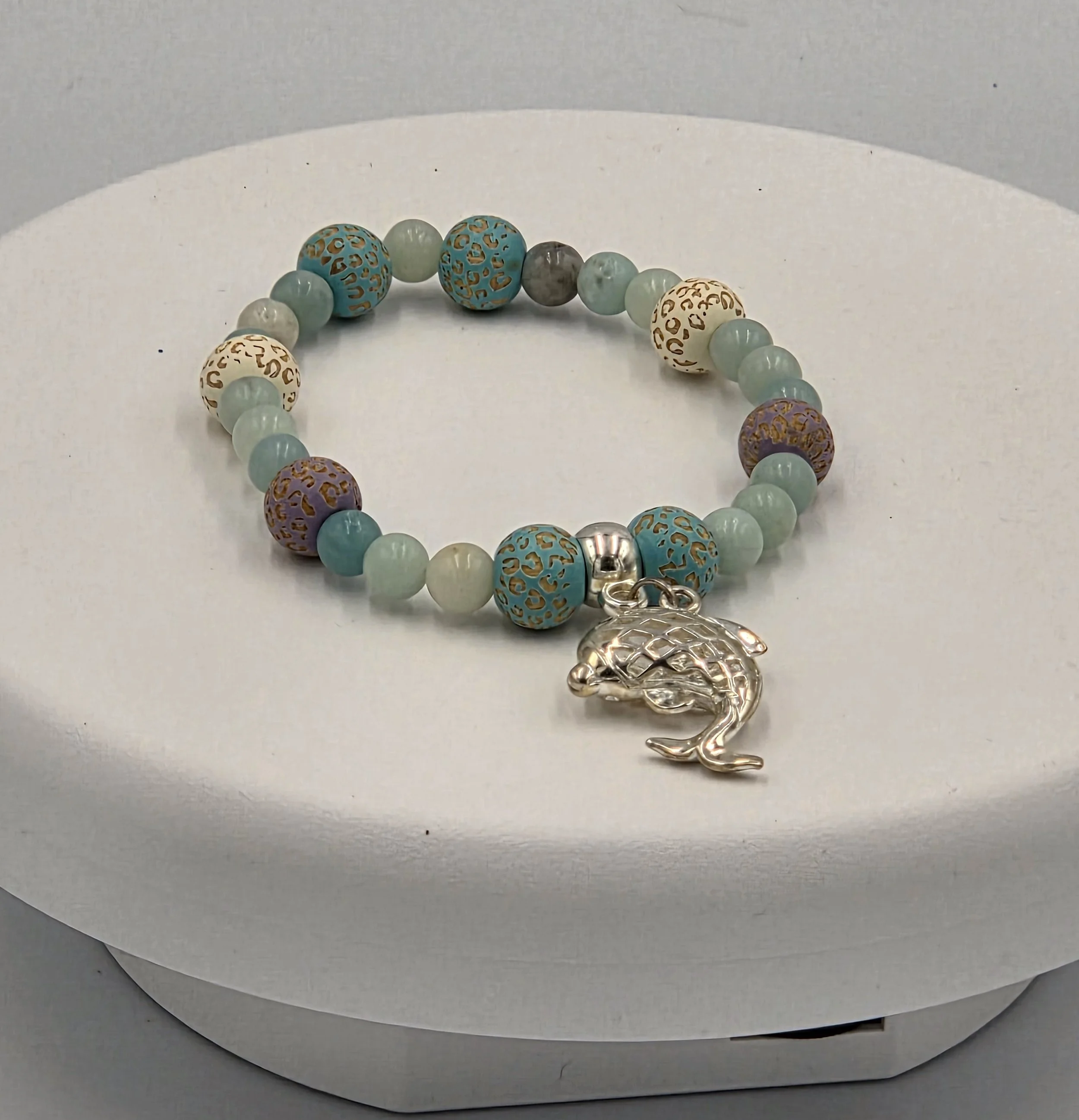 OOAK blue and mauve patterned wood and Amazonite elastic bracelet with a large silver dolphin.