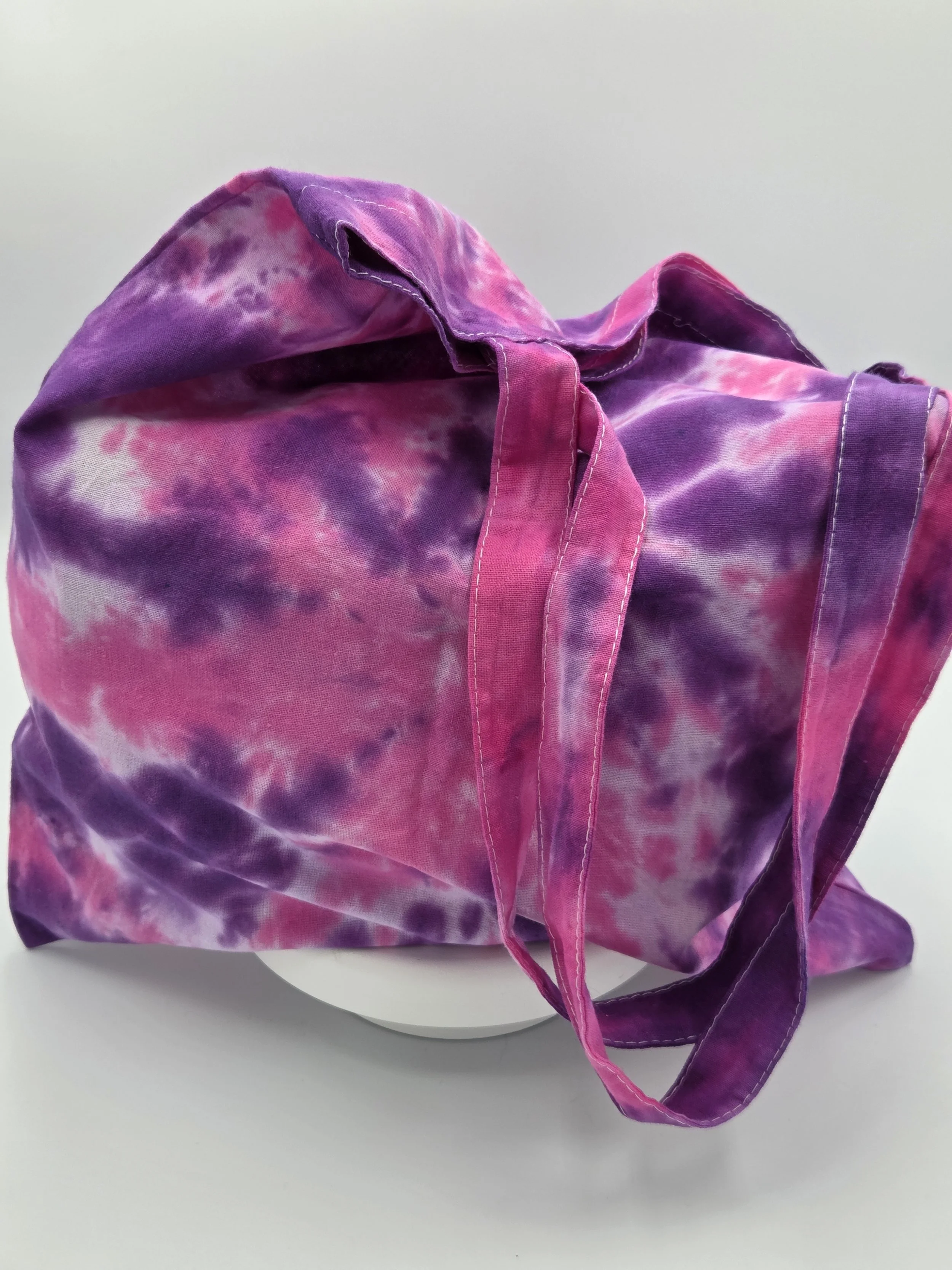Hand dyed tote in spider patter of dark purple and magneta. one of a kind from the livity studio