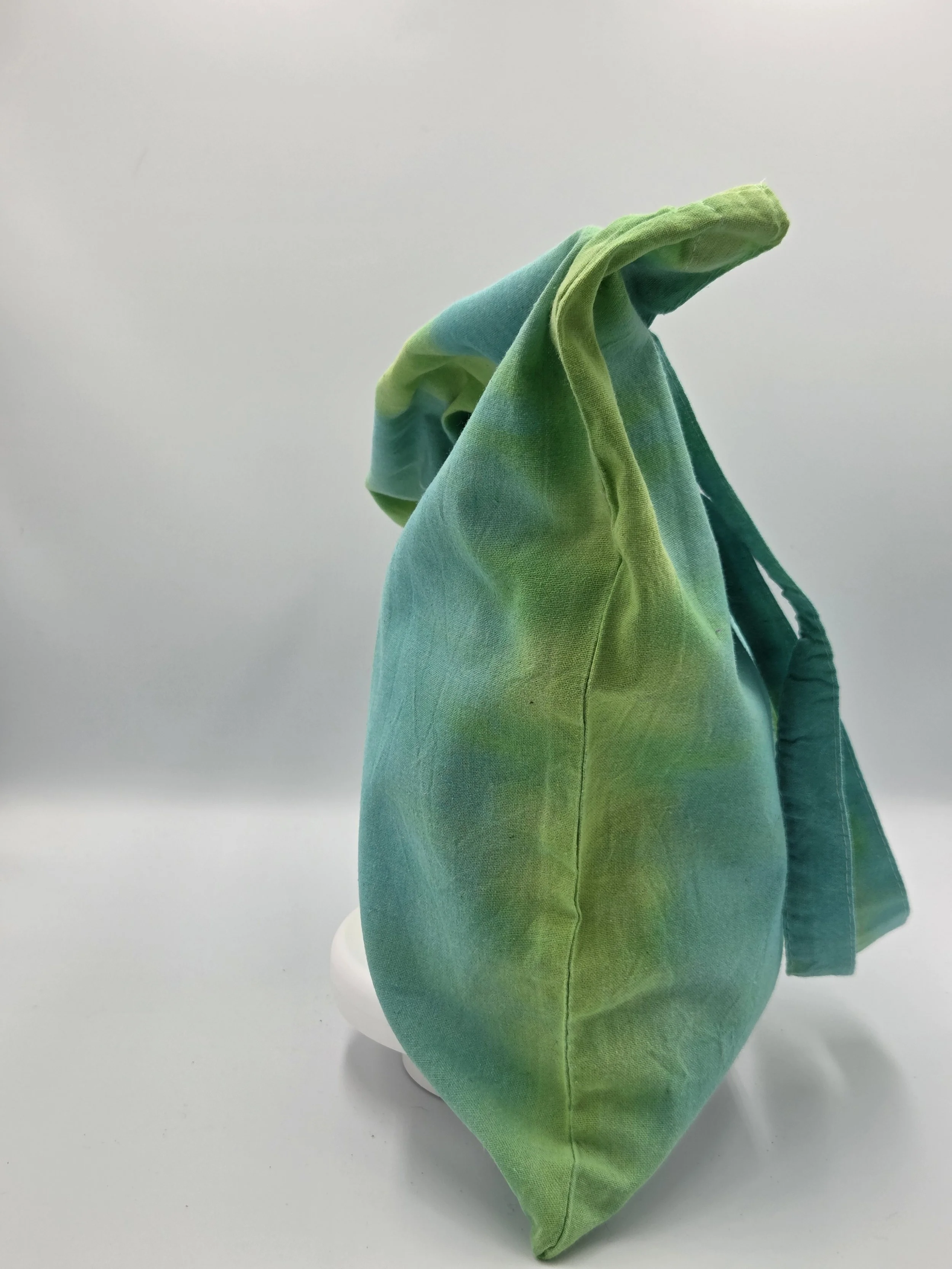 "Artisan handmade tote bag featuring wide vertical stripes of lime green and teal. Eco-friendly 100% cotton shopper by Livity and the Creative i."