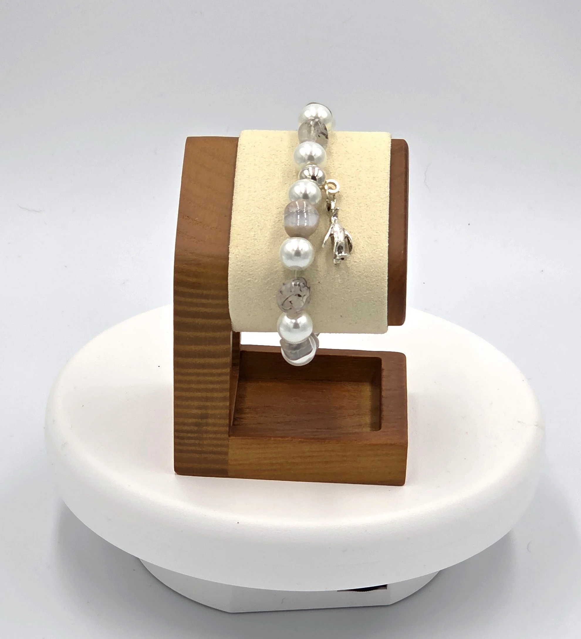 OOAK white pearl and translucent brown agate bracelet with silver penguin charm.
