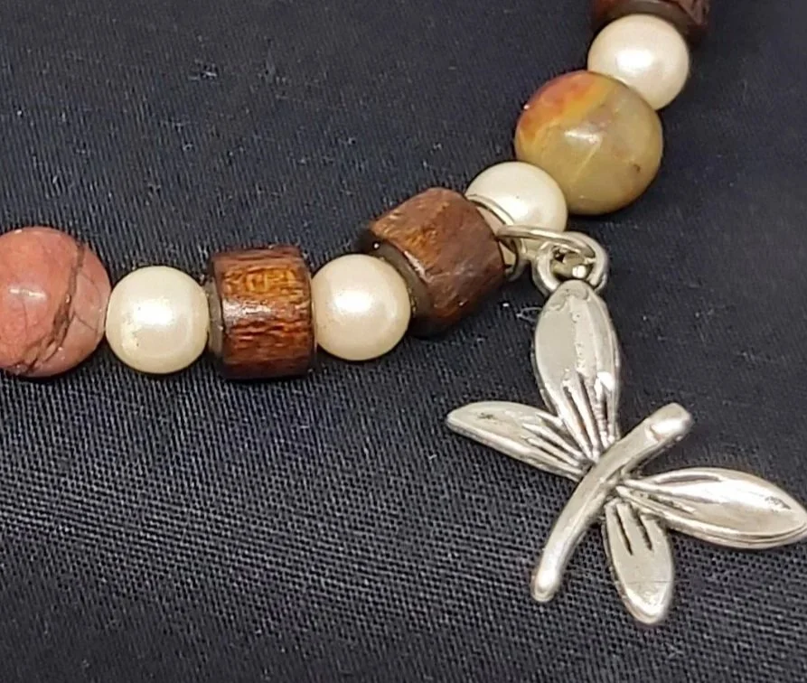 Genuine Picture Jasper, genuine freshwater pearls, and structured dark brown wood beads with a silver dragonfly charm (silver-plated).
