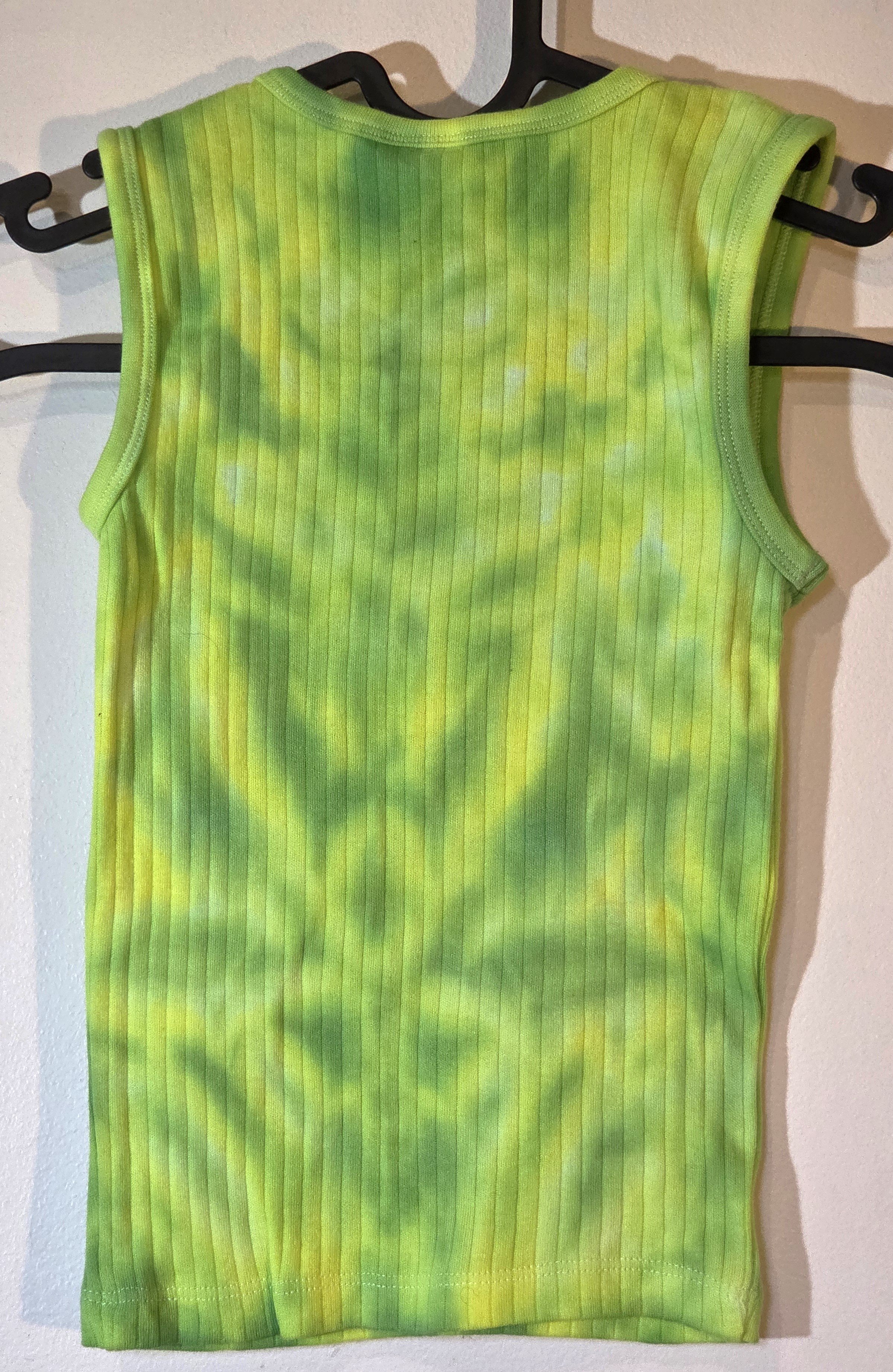 back view of A child's ribbed singlet featuring a faint, pastel tie-dye pattern of lime green and yellow that creates a soft abstract flower shape near the bottom hem.
