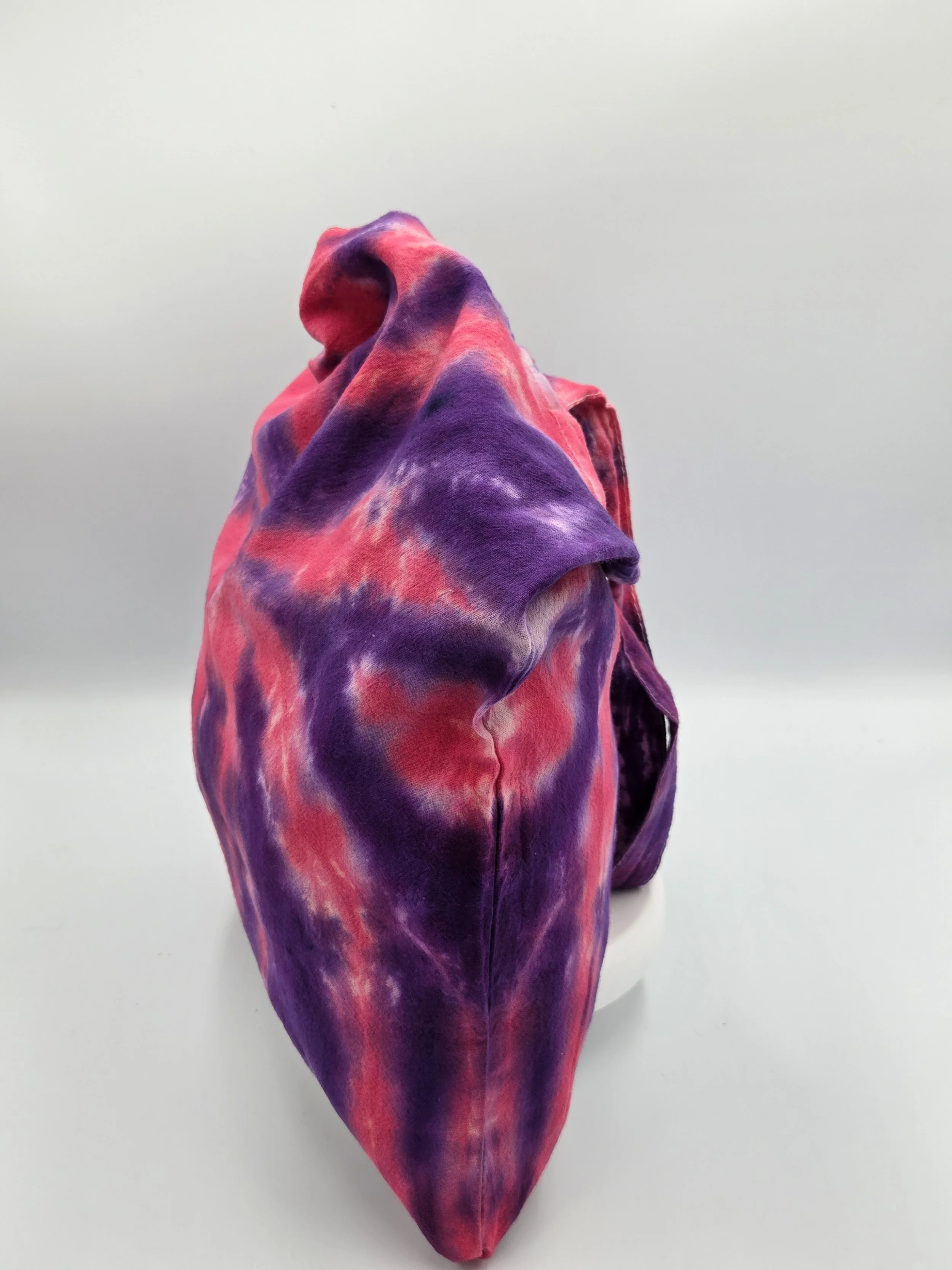 Hand-dyed cotton tote bag with a sharp purple and raspberry spider design. OOAK textile art handmade in Canberra by Livity Studio.