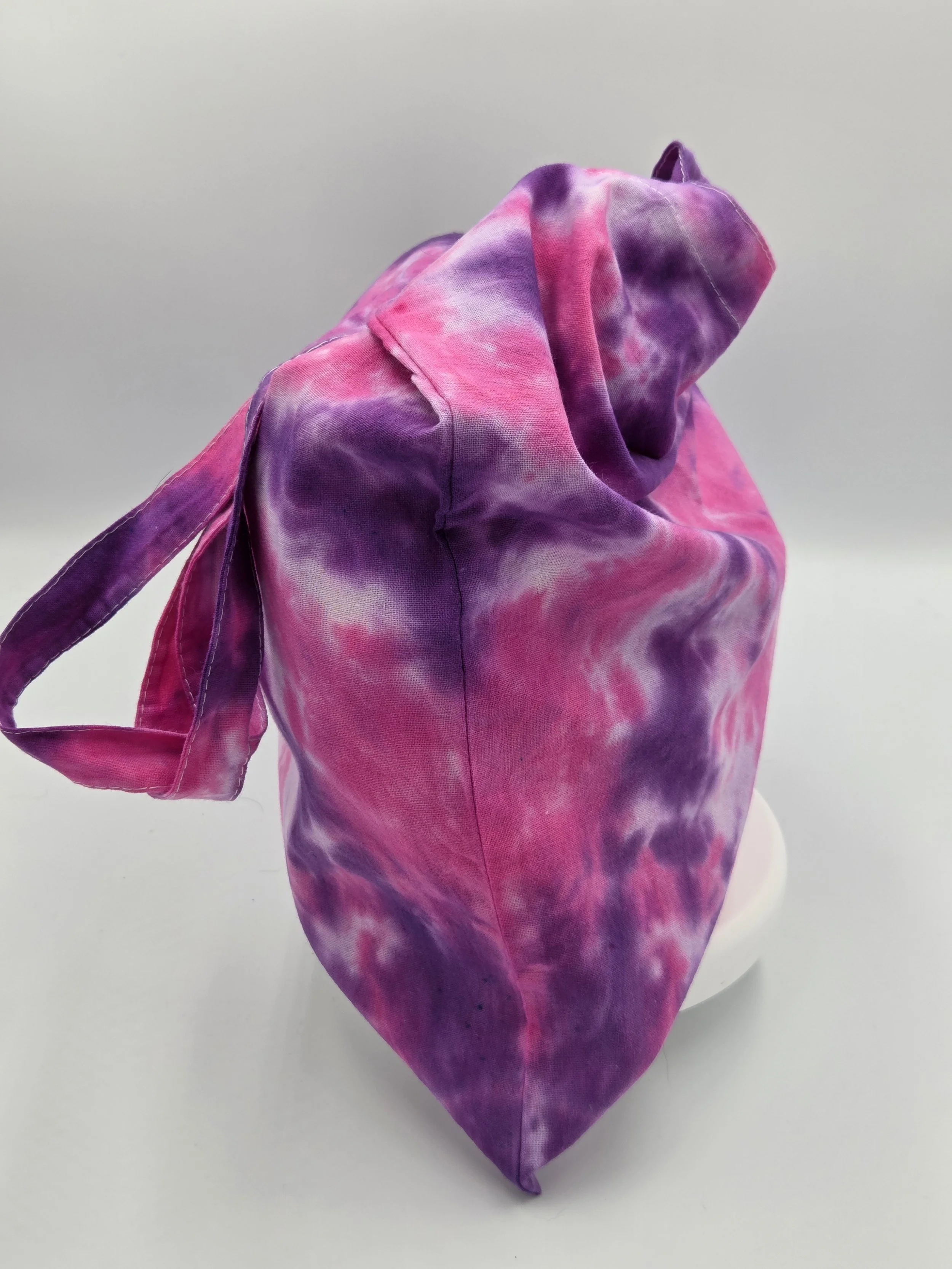 side view Hand dyed tote in spider patter of dark purple and magneta. one of a kind from the livity studio