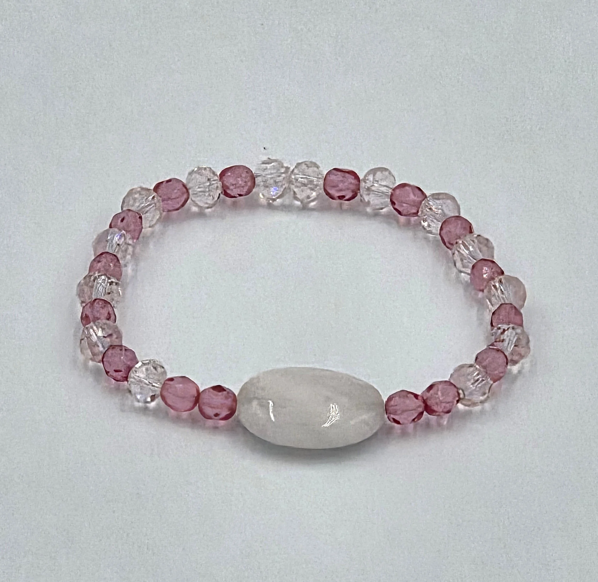 OOAK large rose quartz oval bracelet with sparkling pink and clear faceted crystals.