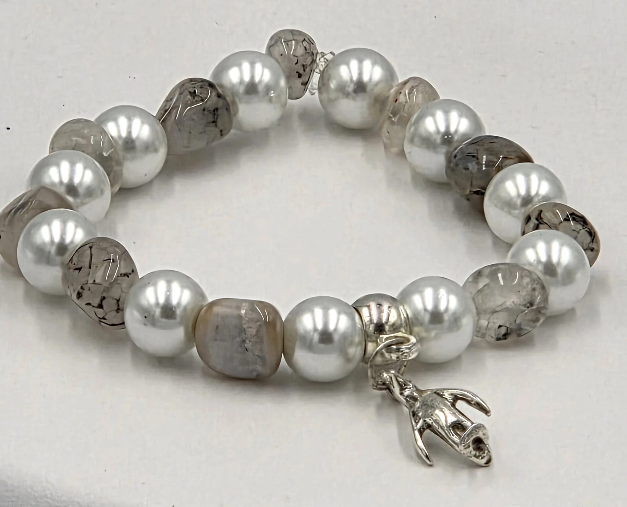 OOAK white pearl and translucent brown agate bracelet with silver penguin charm.