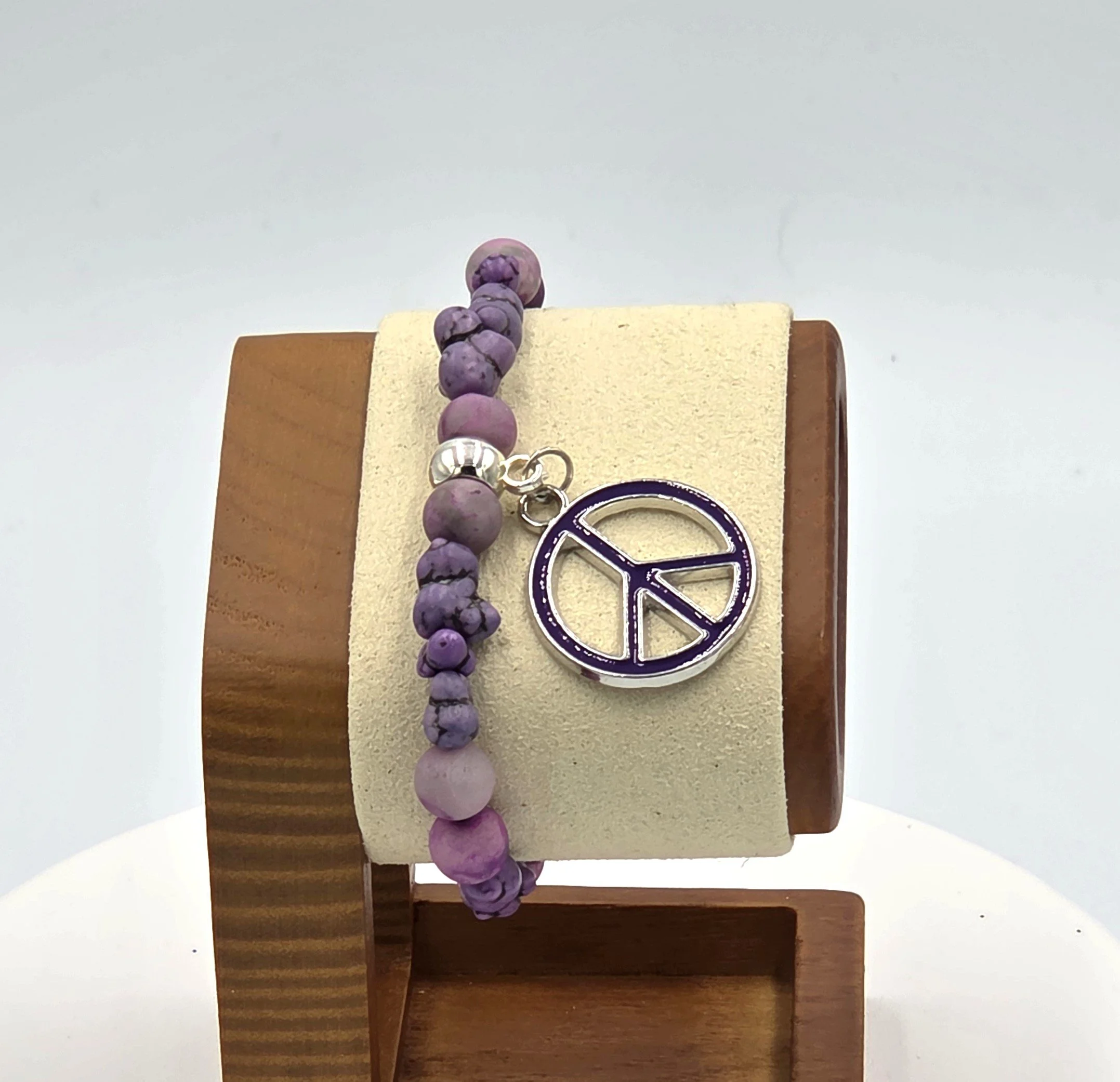 OOAK variegated purple agate bracelet with howlite nuggets and large peace charm.