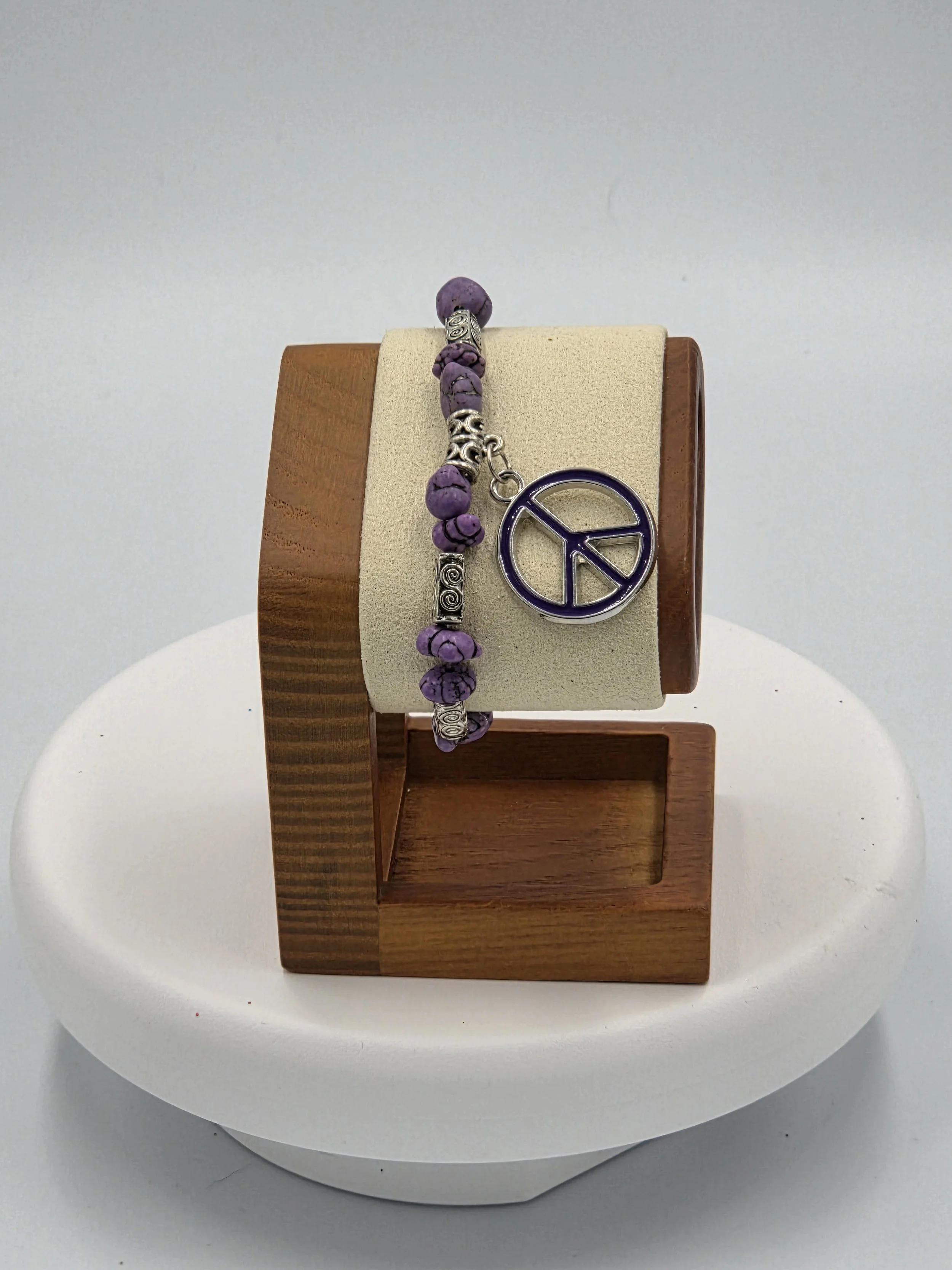 OOAK purple howlite bracelet with celtic tubes and peace charm.