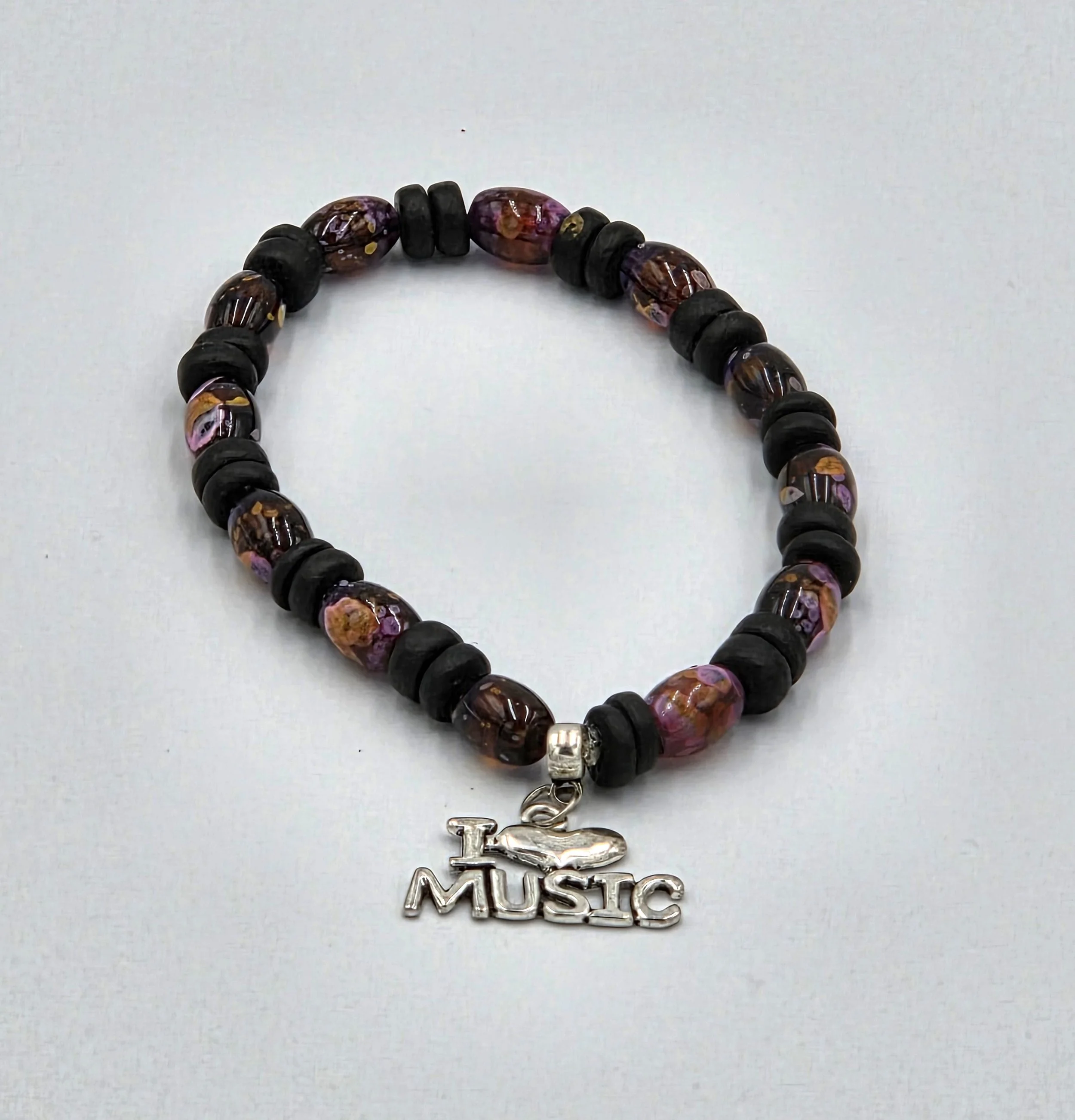 OOAK black wood disc and floral lampwork glass "I ♥ Music" bracelet or anklet.
