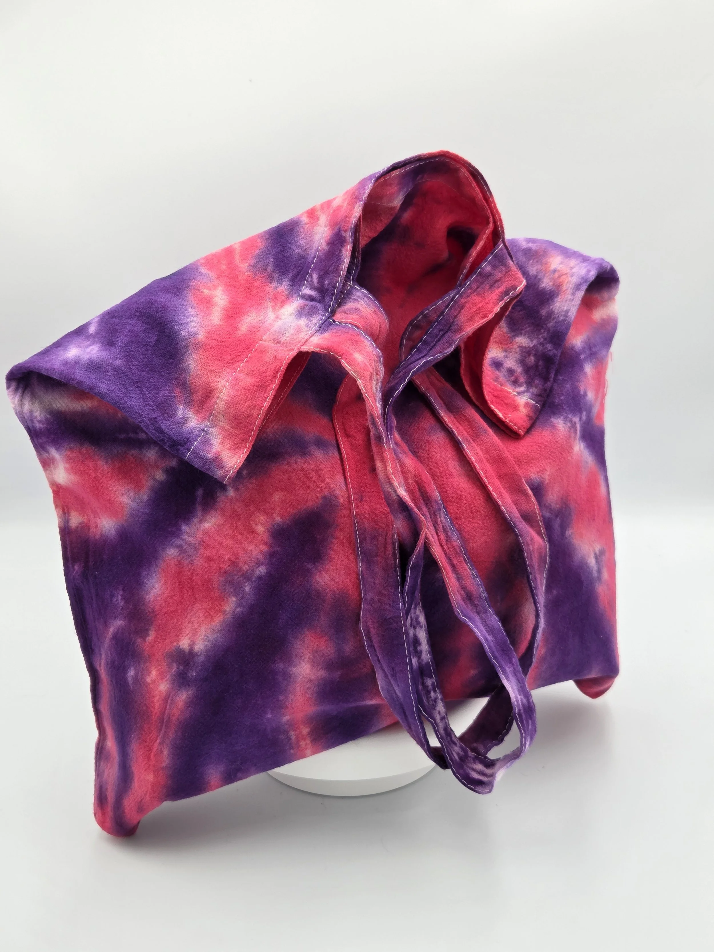 Hand-dyed cotton tote bag with a sharp purple and raspberry spider design. OOAK textile art handmade in Canberra by Livity Studio.