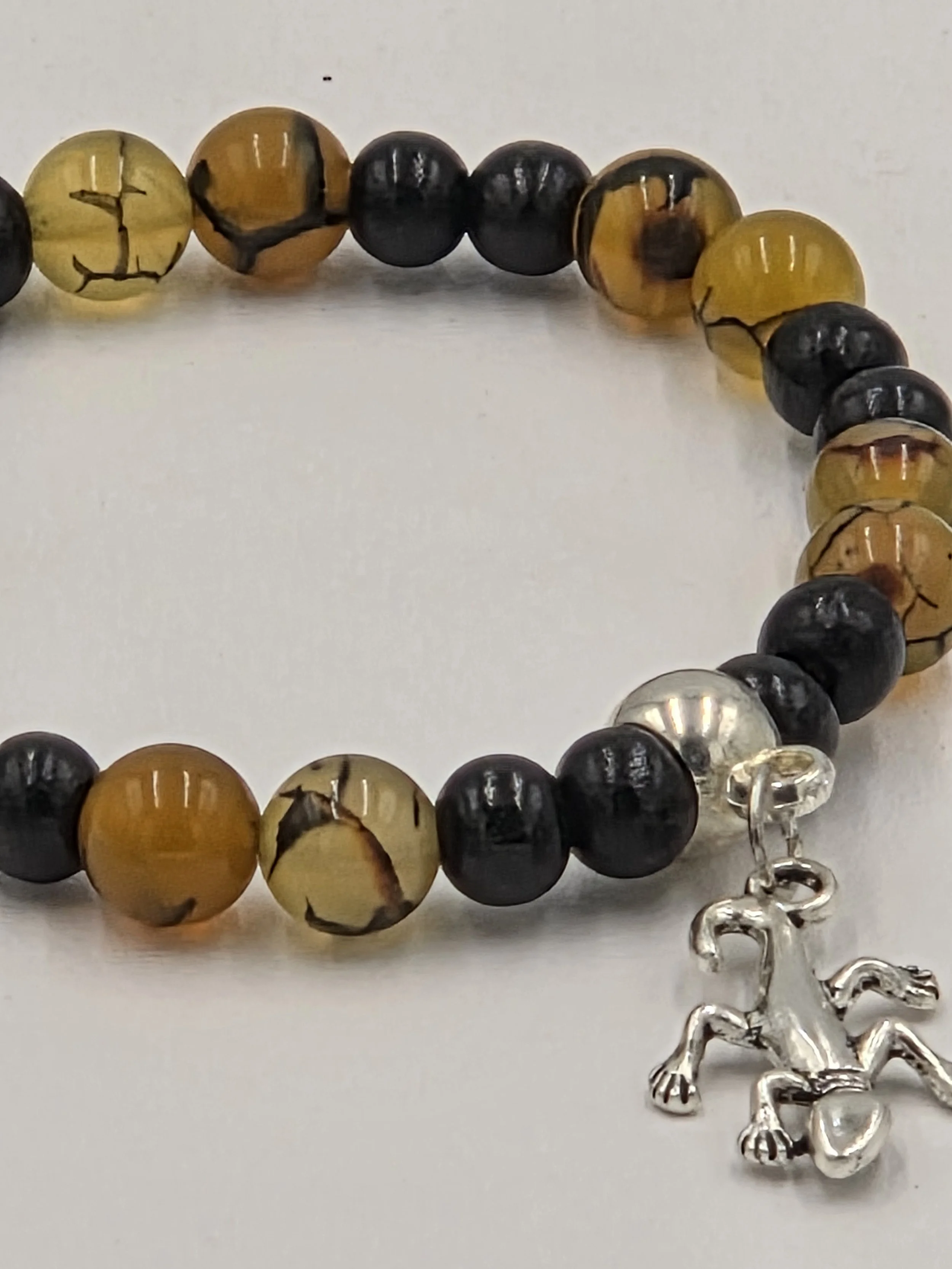 OOAK golden dragon vein agate and black wood bracelet with silver gecko charm.
