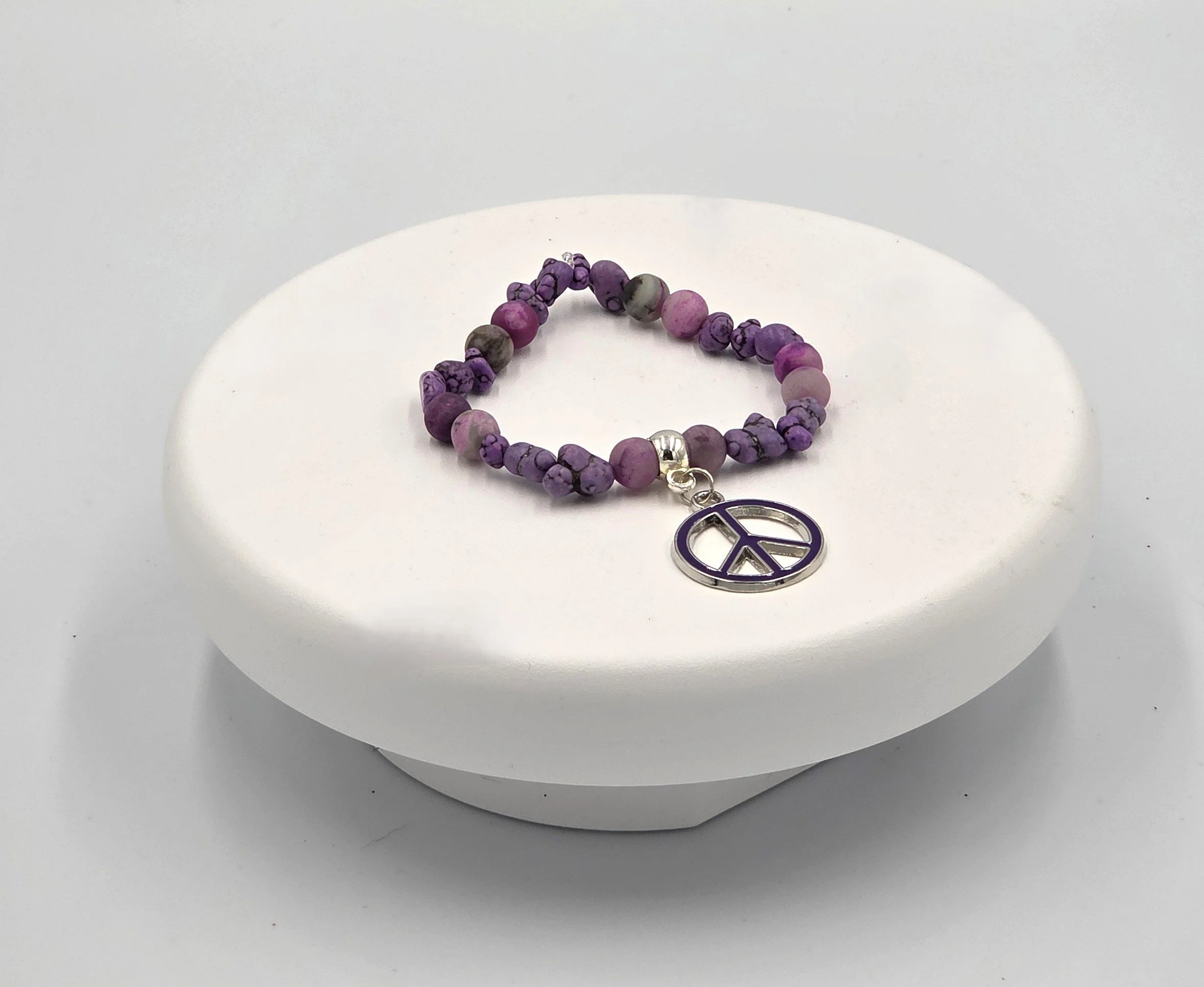 OOAK variegated purple agate bracelet with howlite nuggets and large peace charm.