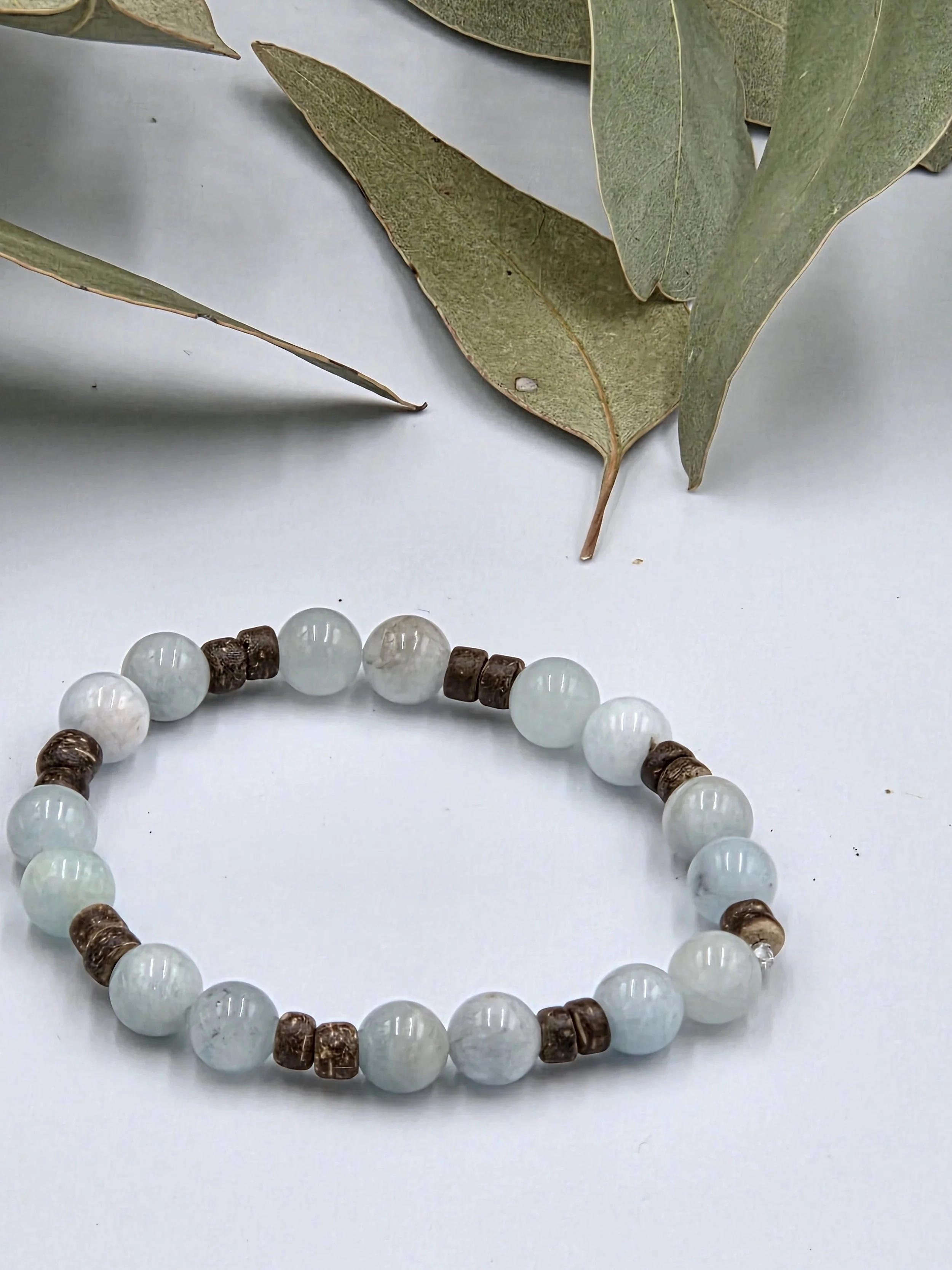 OOAK premium aquamarine and fine coconut disc alternating elastic bracelet.