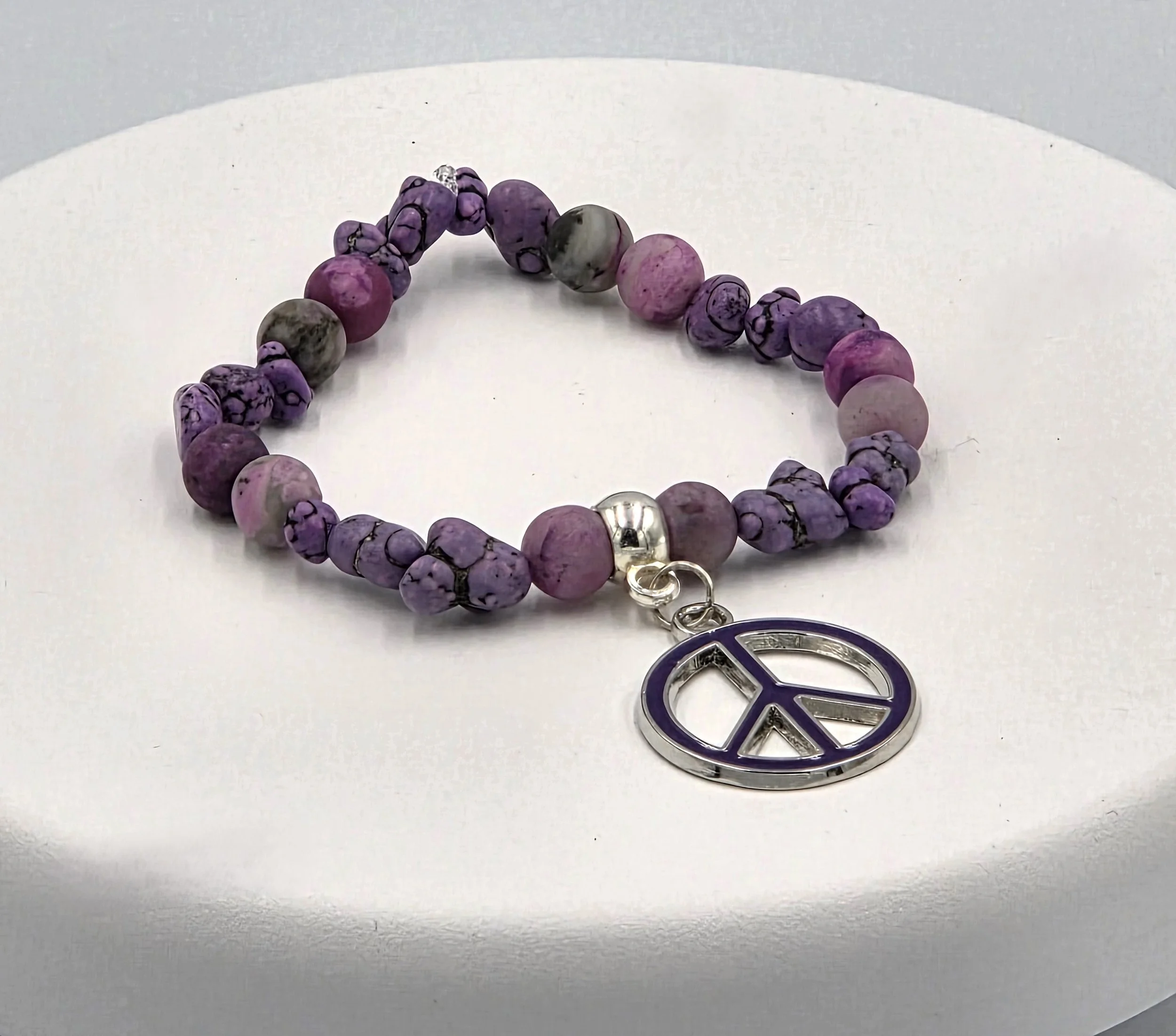 OOAK variegated purple agate bracelet with howlite nuggets and large peace charm.