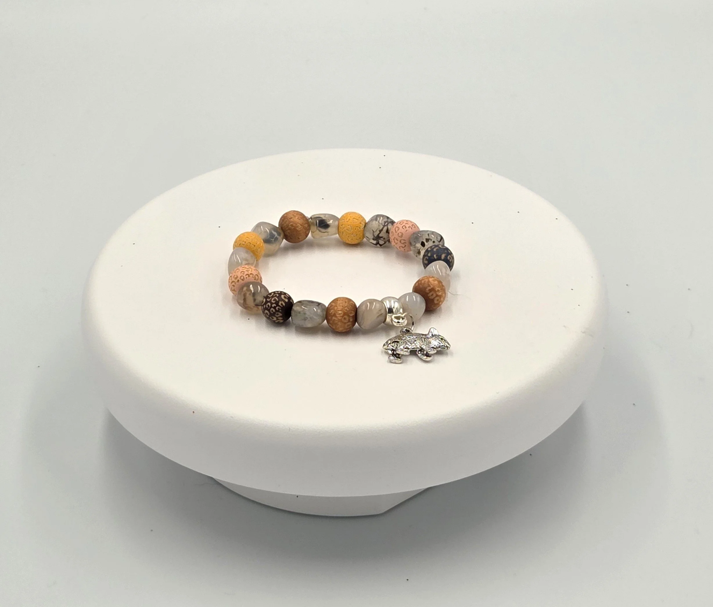 OOAK agate and leopard print wood bracelet with silver wombat charm.