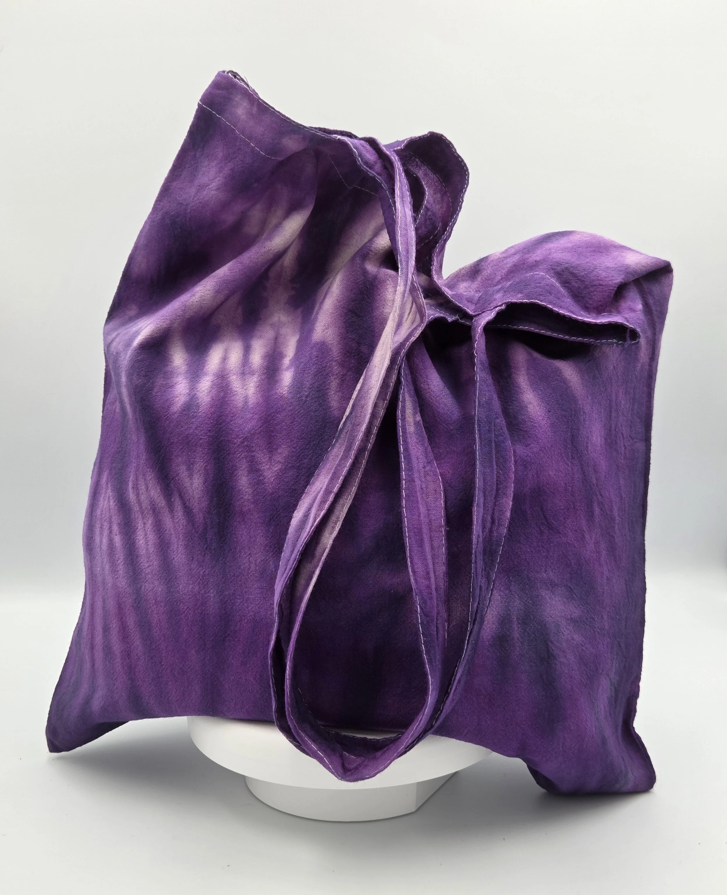 Livity Original hand-dyed calico cotton tote bag featuring a deep purple 'Tiger Skin' vertical resist pattern. One-of-a-kind textile art handmade in Canberra.