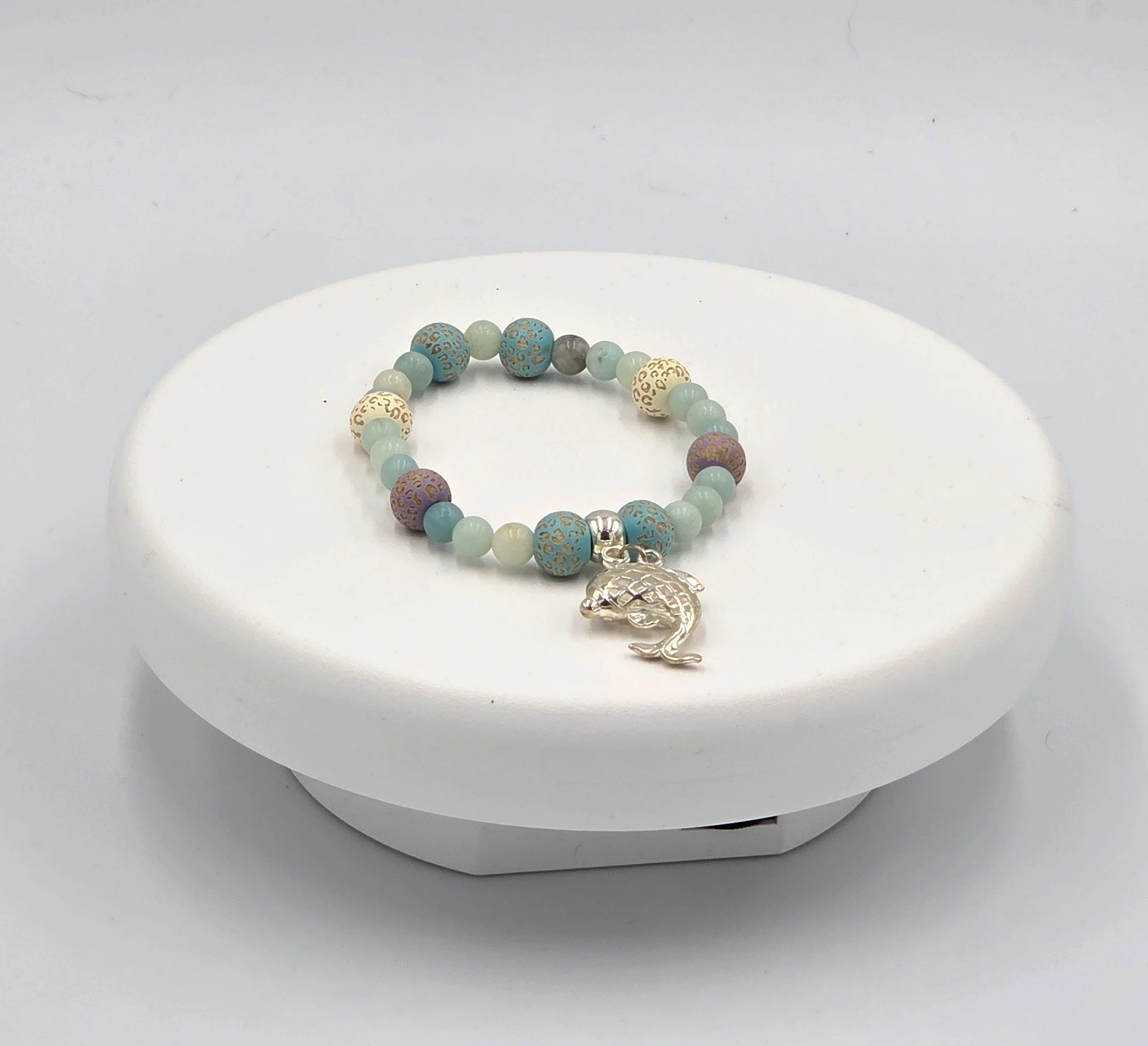 OOAK blue and mauve patterned wood and Amazonite elastic bracelet with a large silver dolphin.