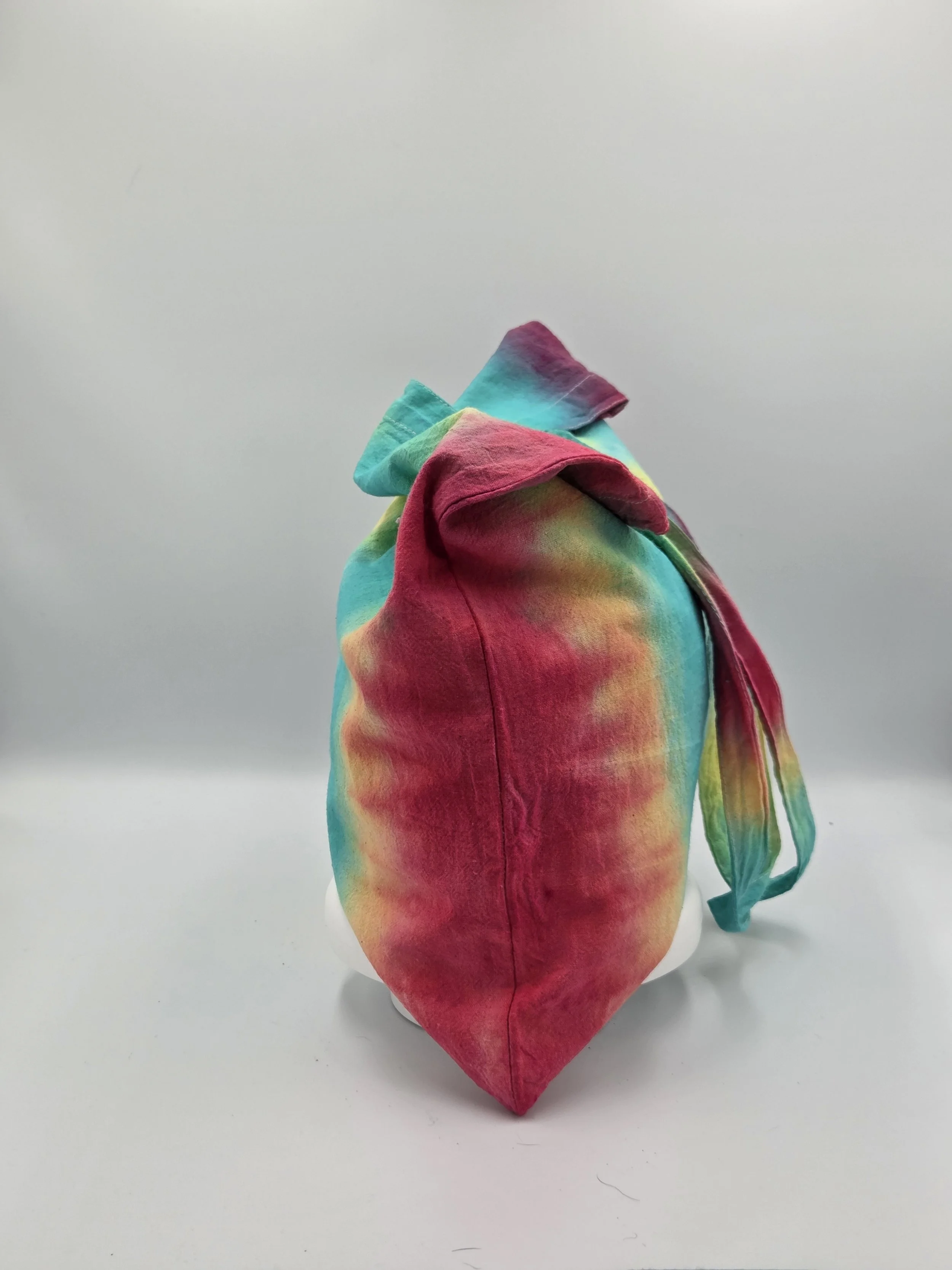 Hand-dyed 100% cotton tote bag with a high-contrast vivid botanical pattern in organic greens and earth tones. OOAK functional art by Livity Studio.