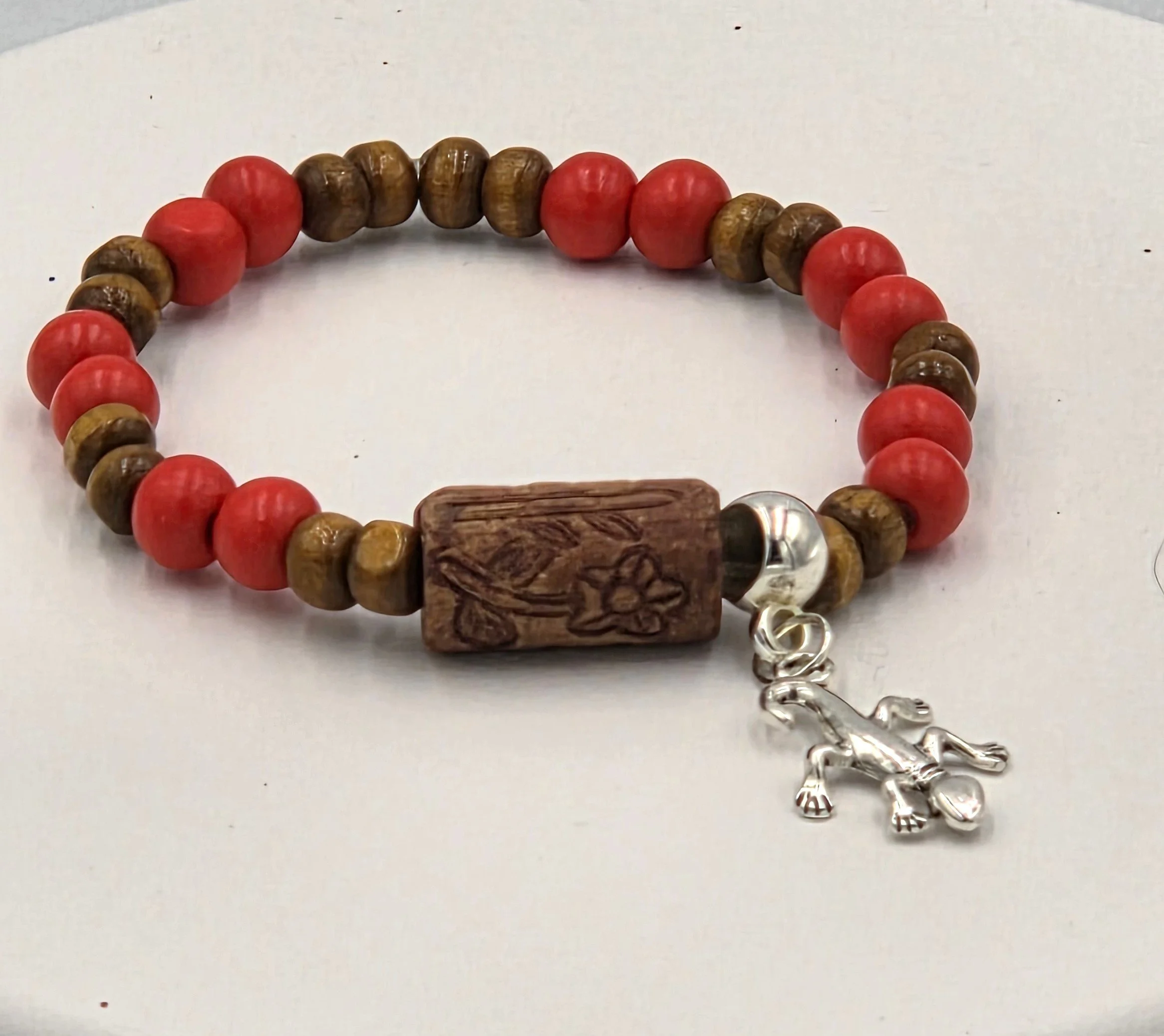 OOAK red and tan wood bracelet with ceramic log bead and silver gecko.