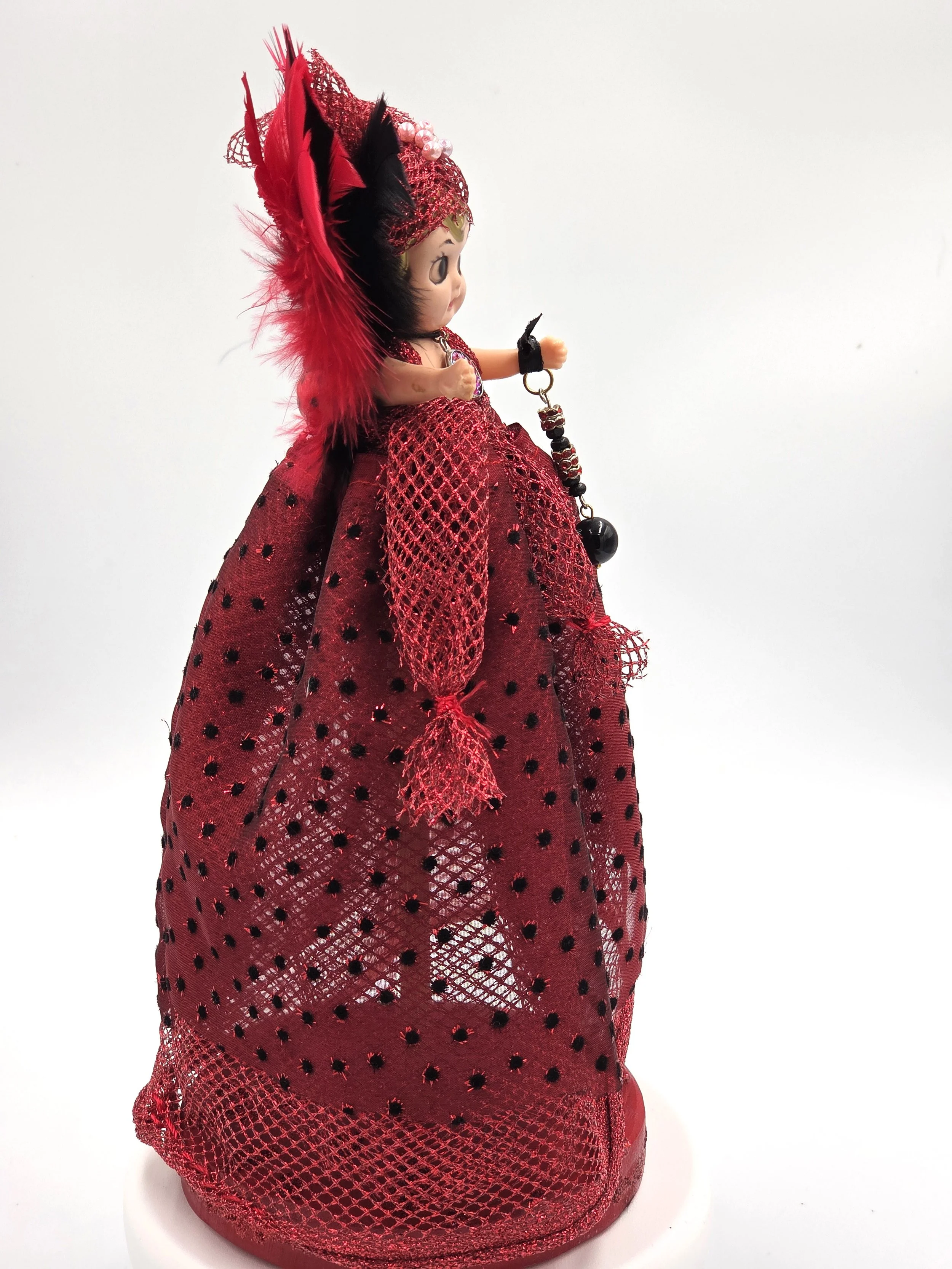 Carmen Figure: OOAK 30cm art doll in striking red and black shiny netting with a feather and pearl headdress.