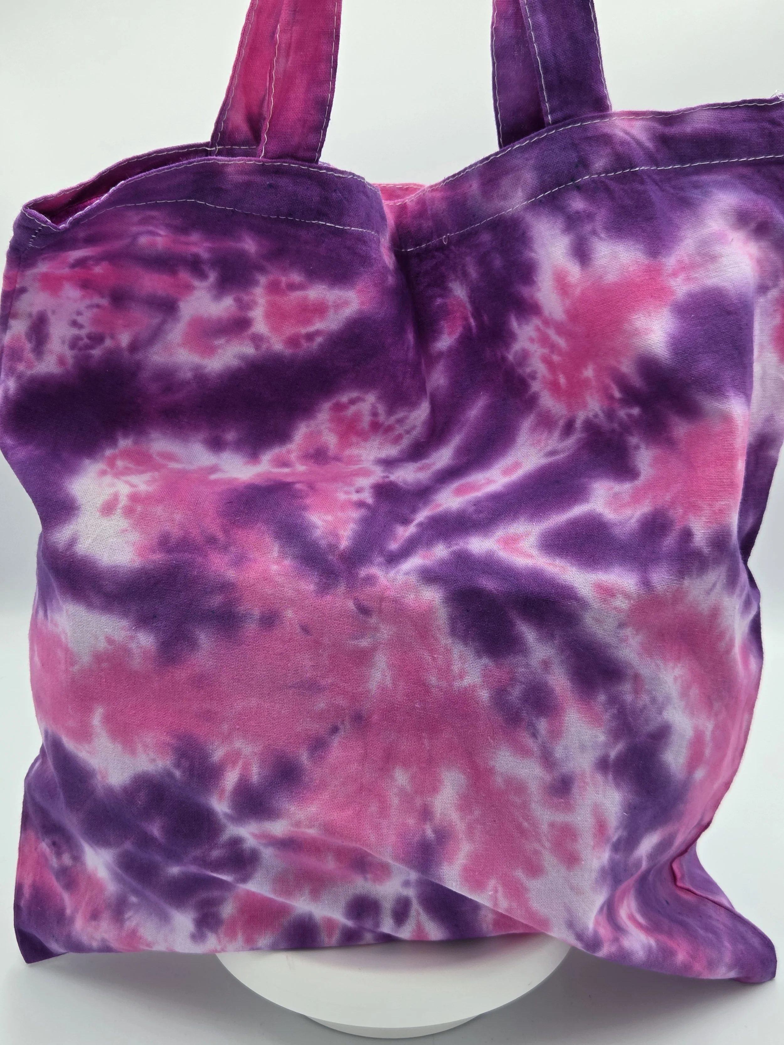 Hand dyed tote in spider patter of dark purple and magneta. one of a kind from the livity studio