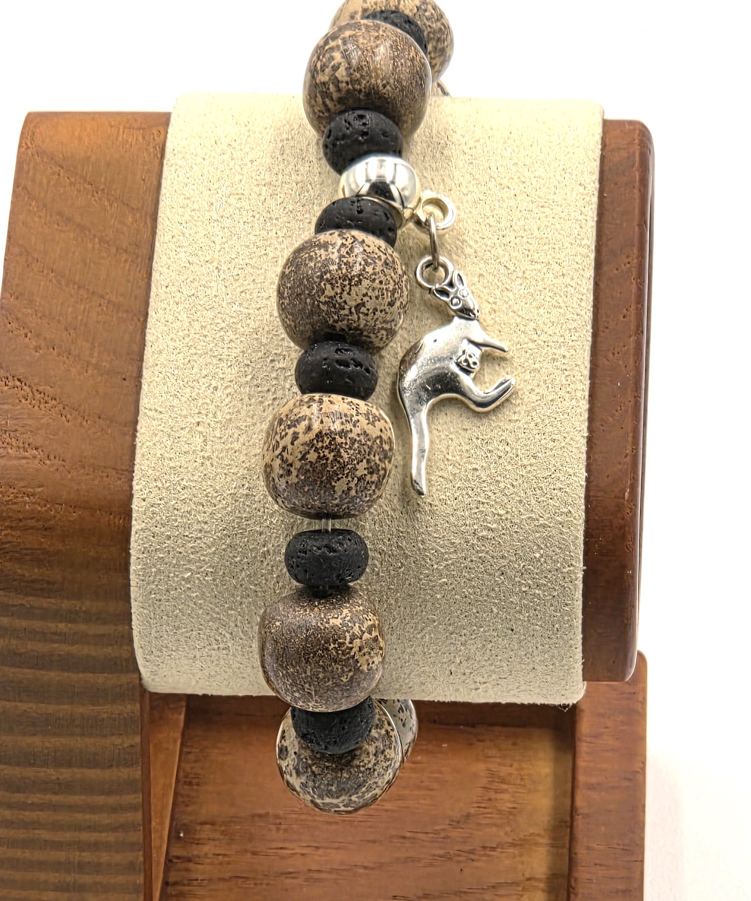 close up of OOAK Australian Heritage brown jasper and black lava bead bracelet with silver kangaroo charm.