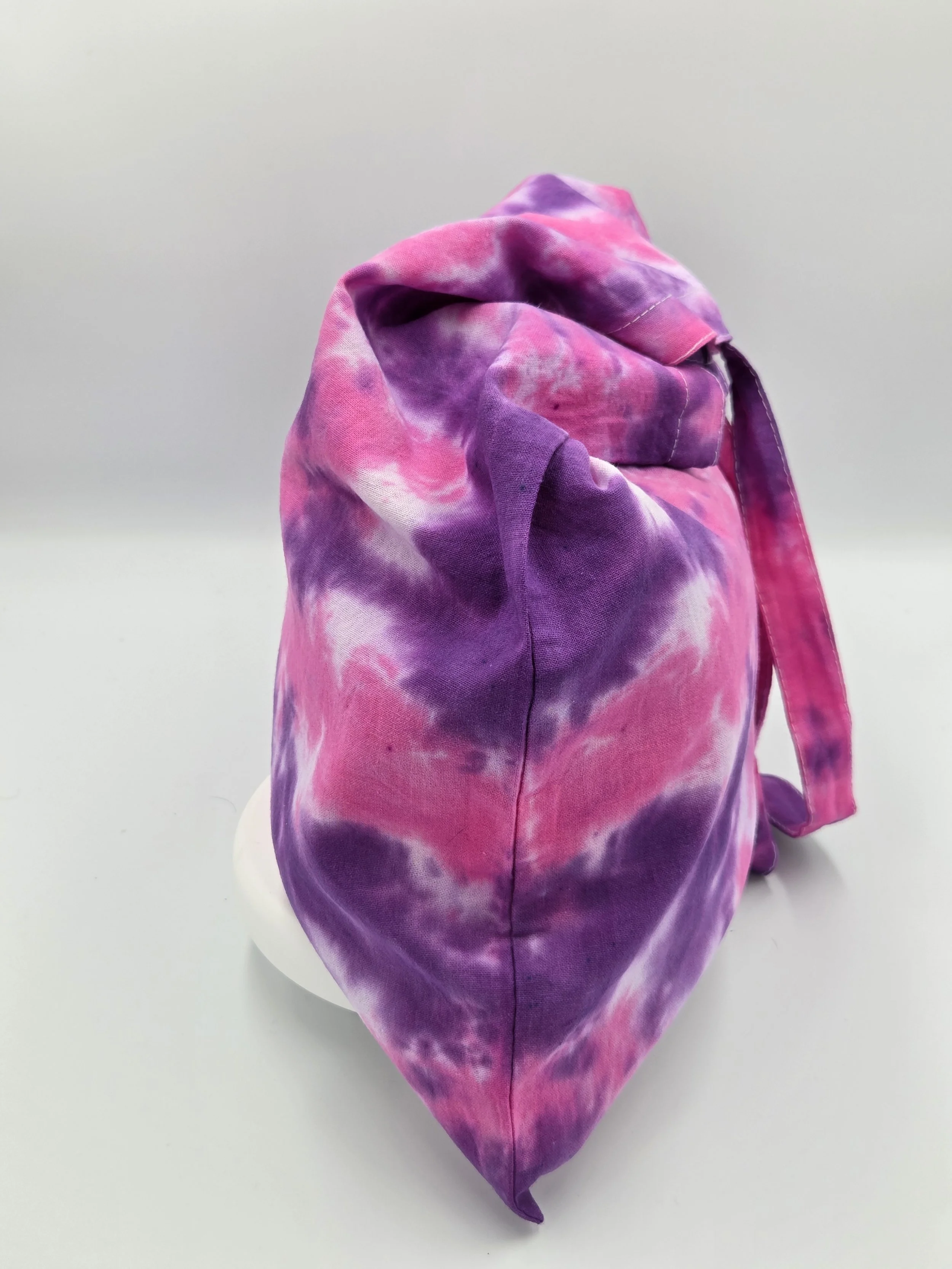 side view Hand dyed tote in spider patter of dark purple and magneta. one of a kind from the livity studio