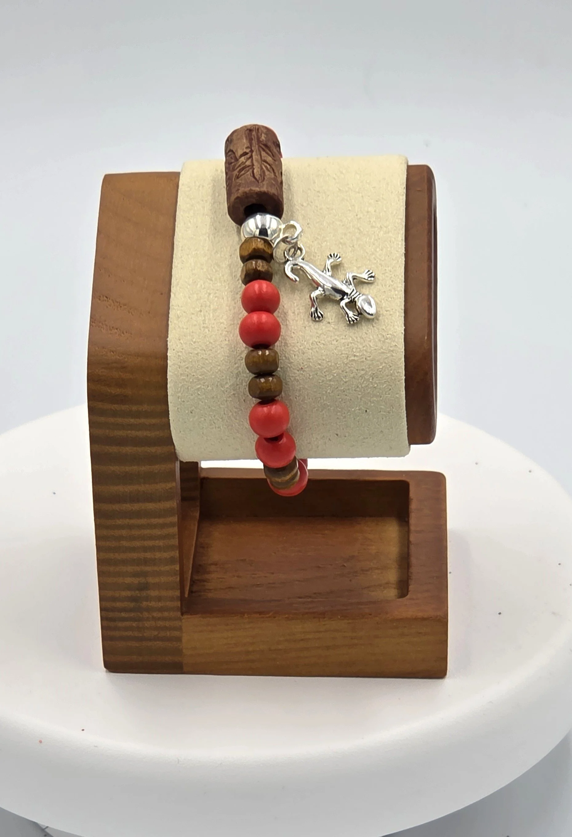 OOAK red and tan wood bracelet with ceramic log bead and silver gecko.