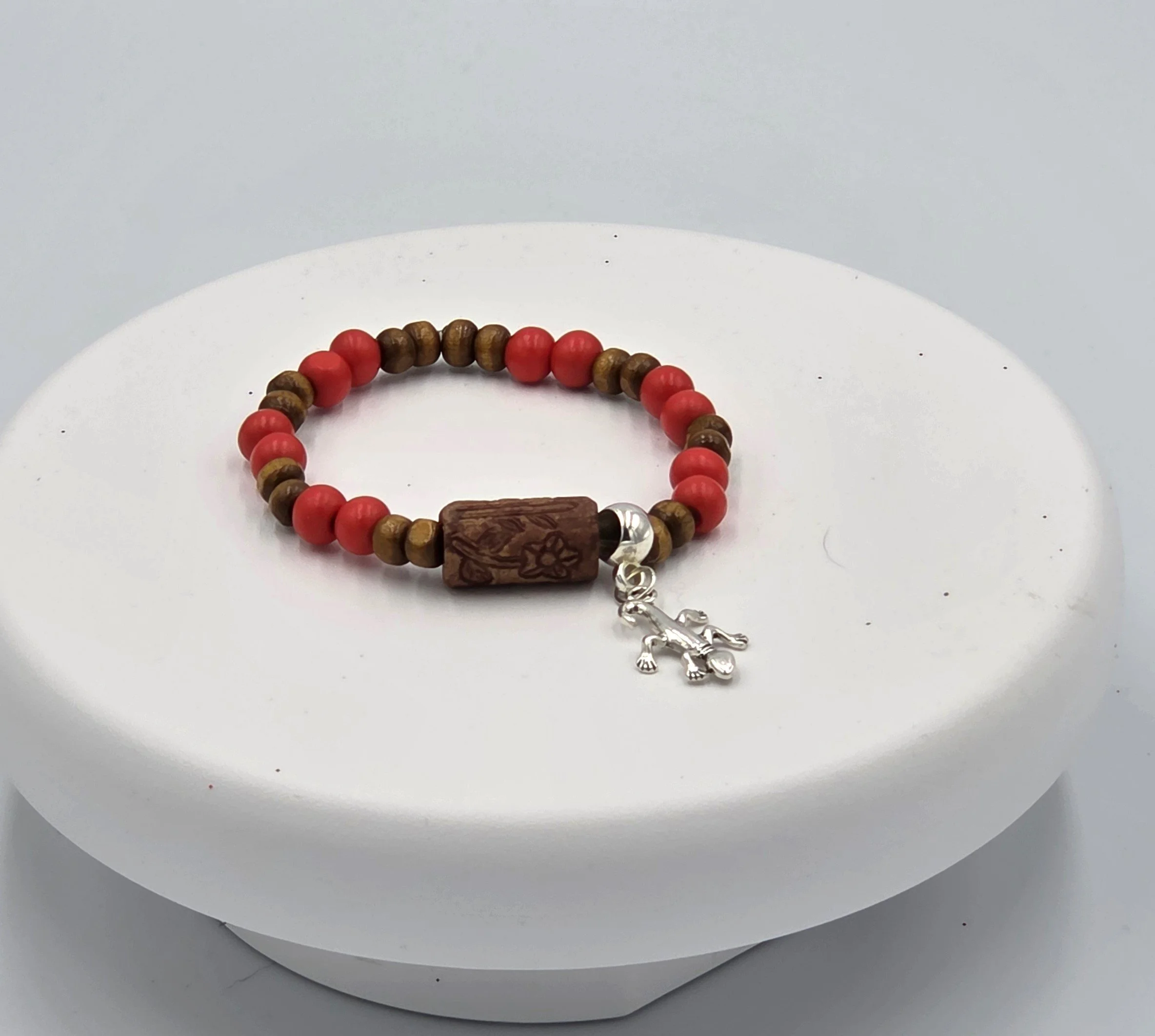 OOAK red and tan wood bracelet with ceramic log bead and silver gecko.