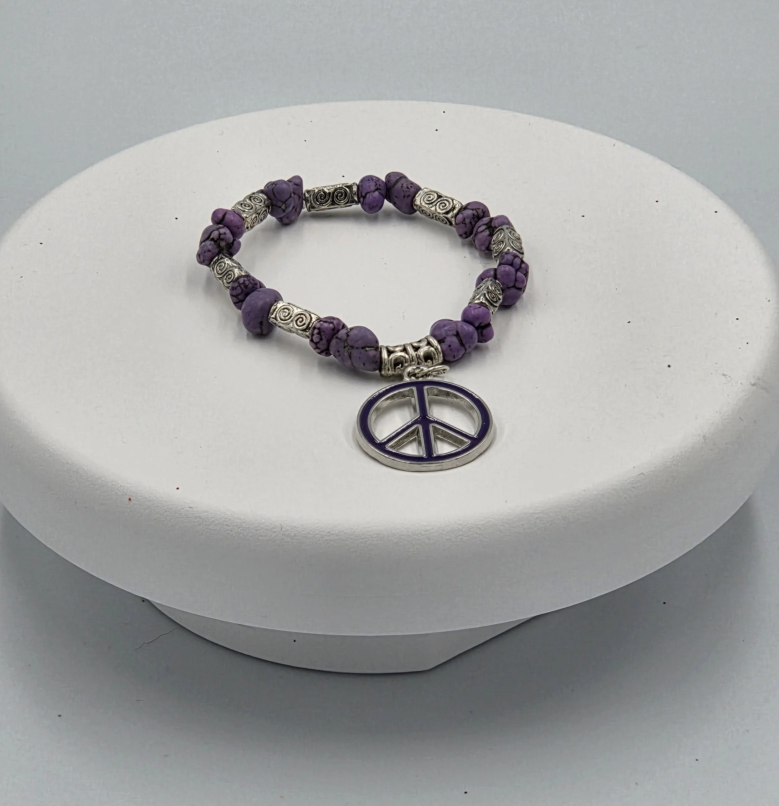 OOAK purple howlite bracelet with celtic tubes and peace charm.