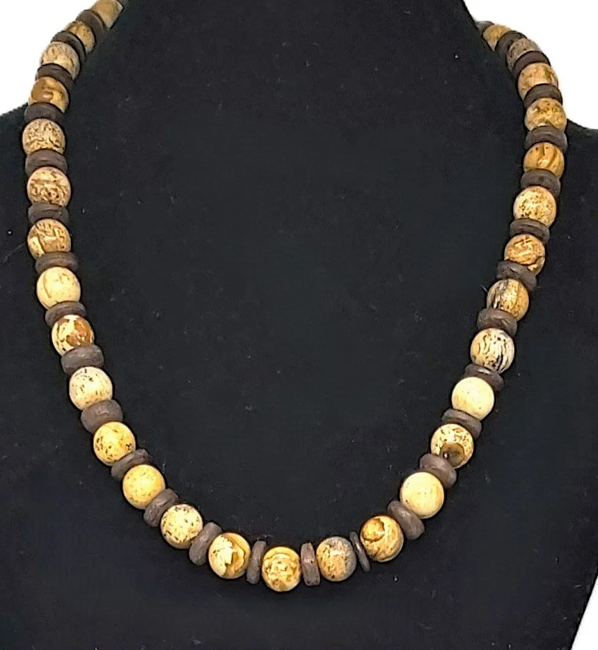 A necklace with genuine Picture Jasper round balls with alternating brown wood discs