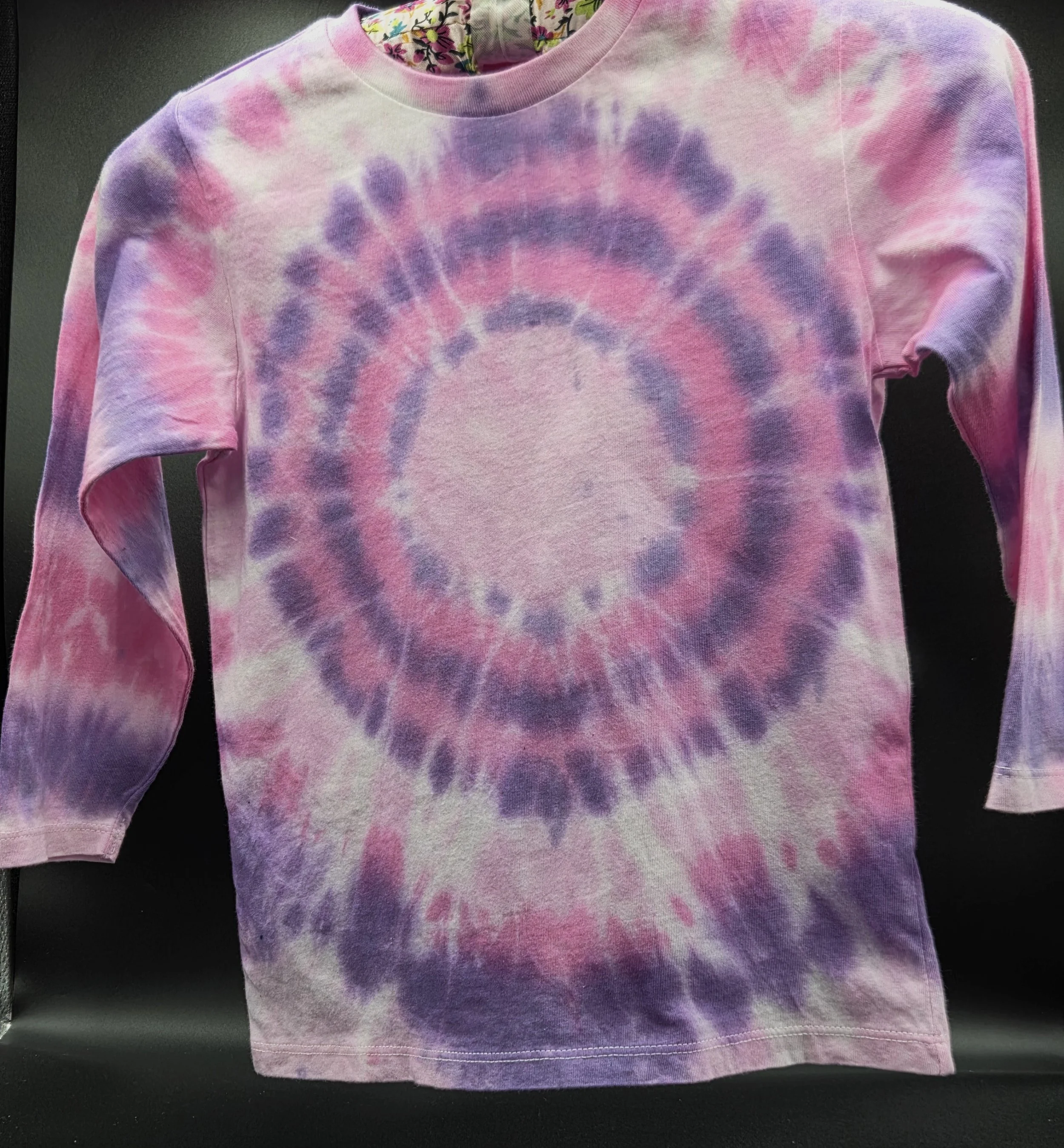 Child's size 4 long-sleeved hand-dyed cotton T-shirt with a pink and purple concentric orbit pattern. OOAK textile art by Livity and the Creative i.