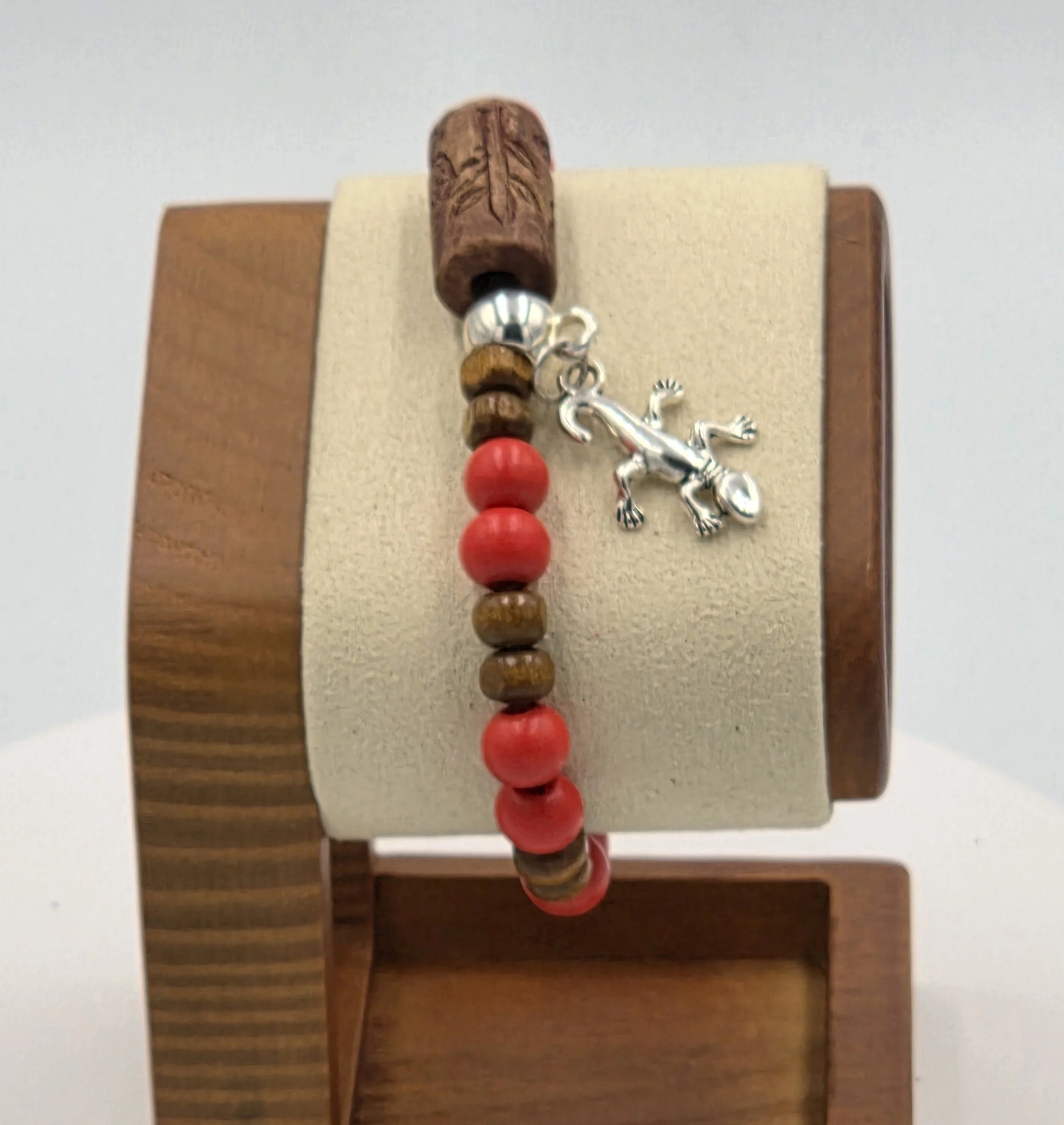 OOAK red and tan wood bracelet with ceramic log bead and silver gecko.