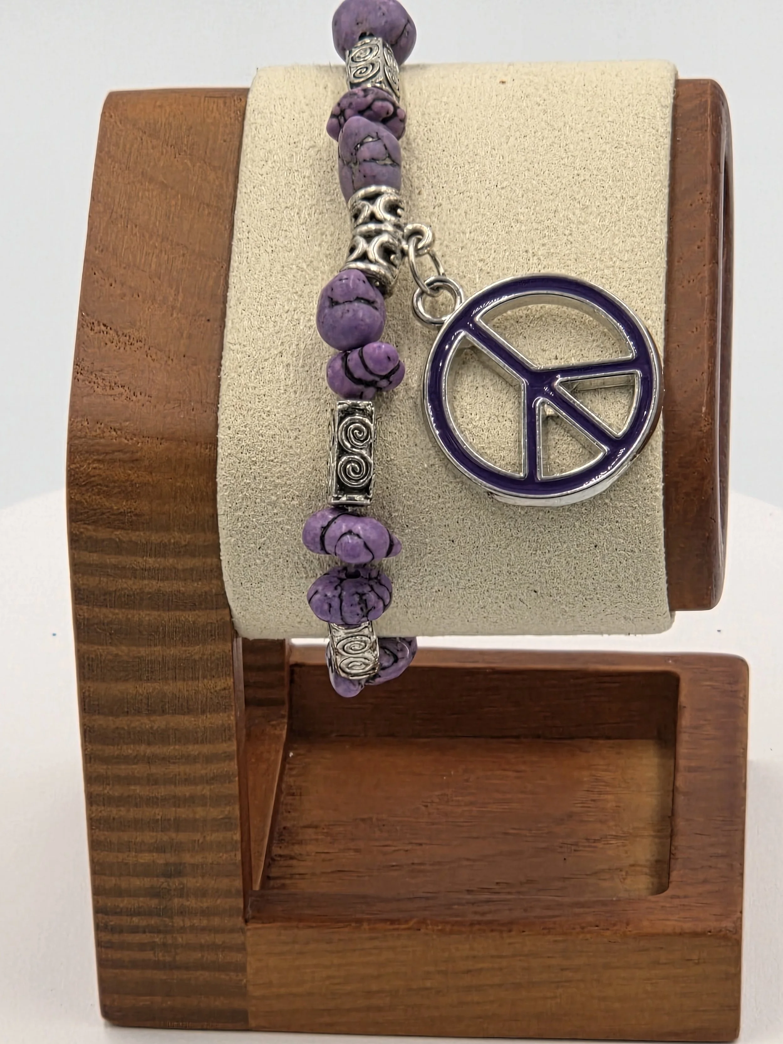 OOAK purple howlite bracelet with celtic tubes and peace charm.