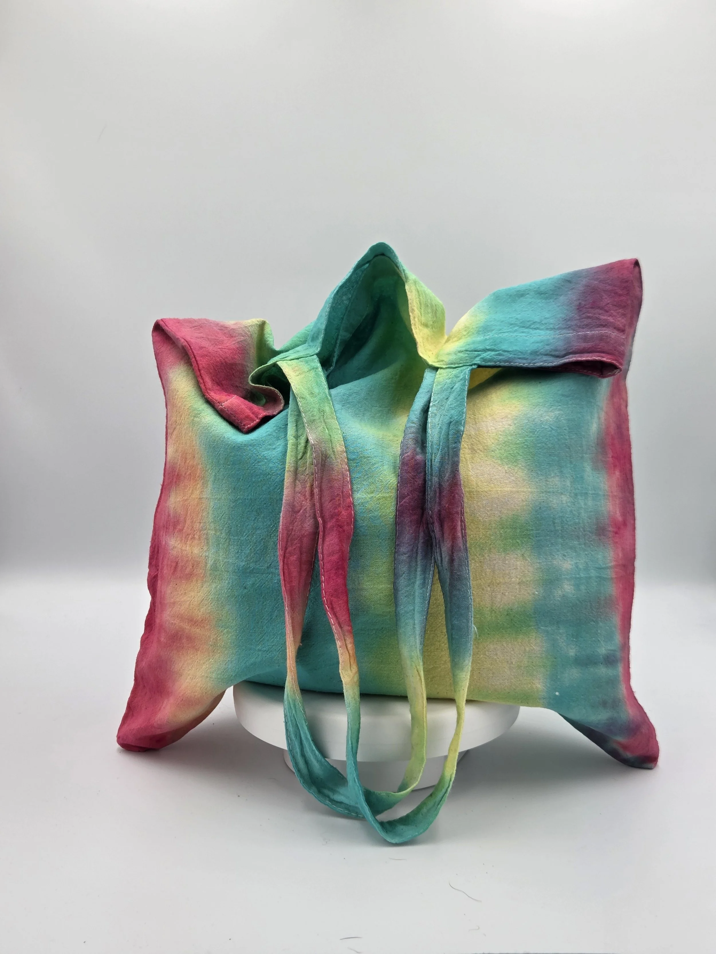 Hand-dyed 100% cotton tote bag with a high-contrast vivid botanical pattern in organic greens and earth tones. OOAK functional art by Livity Studio.