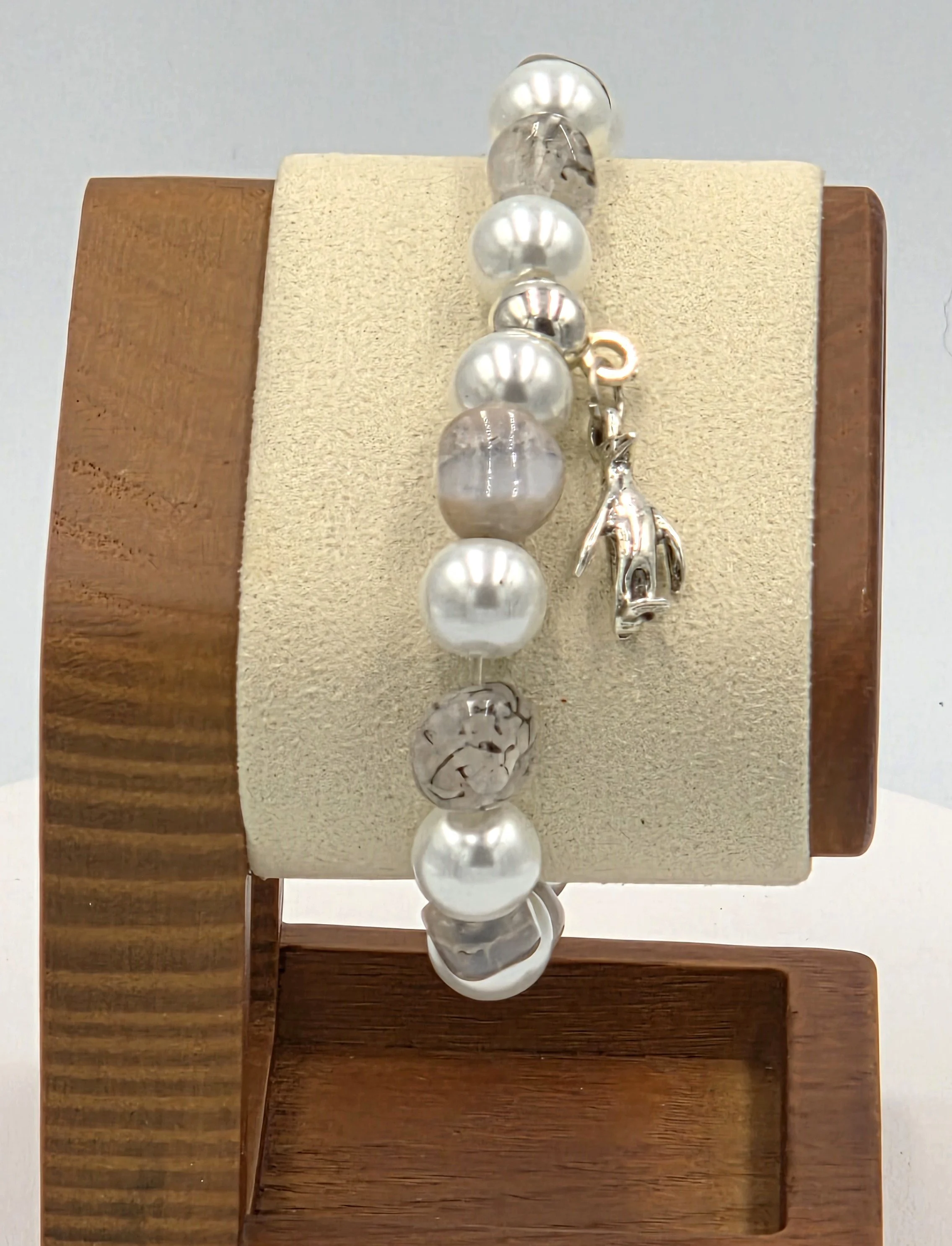 OOAK white pearl and translucent brown agate bracelet with silver penguin charm.