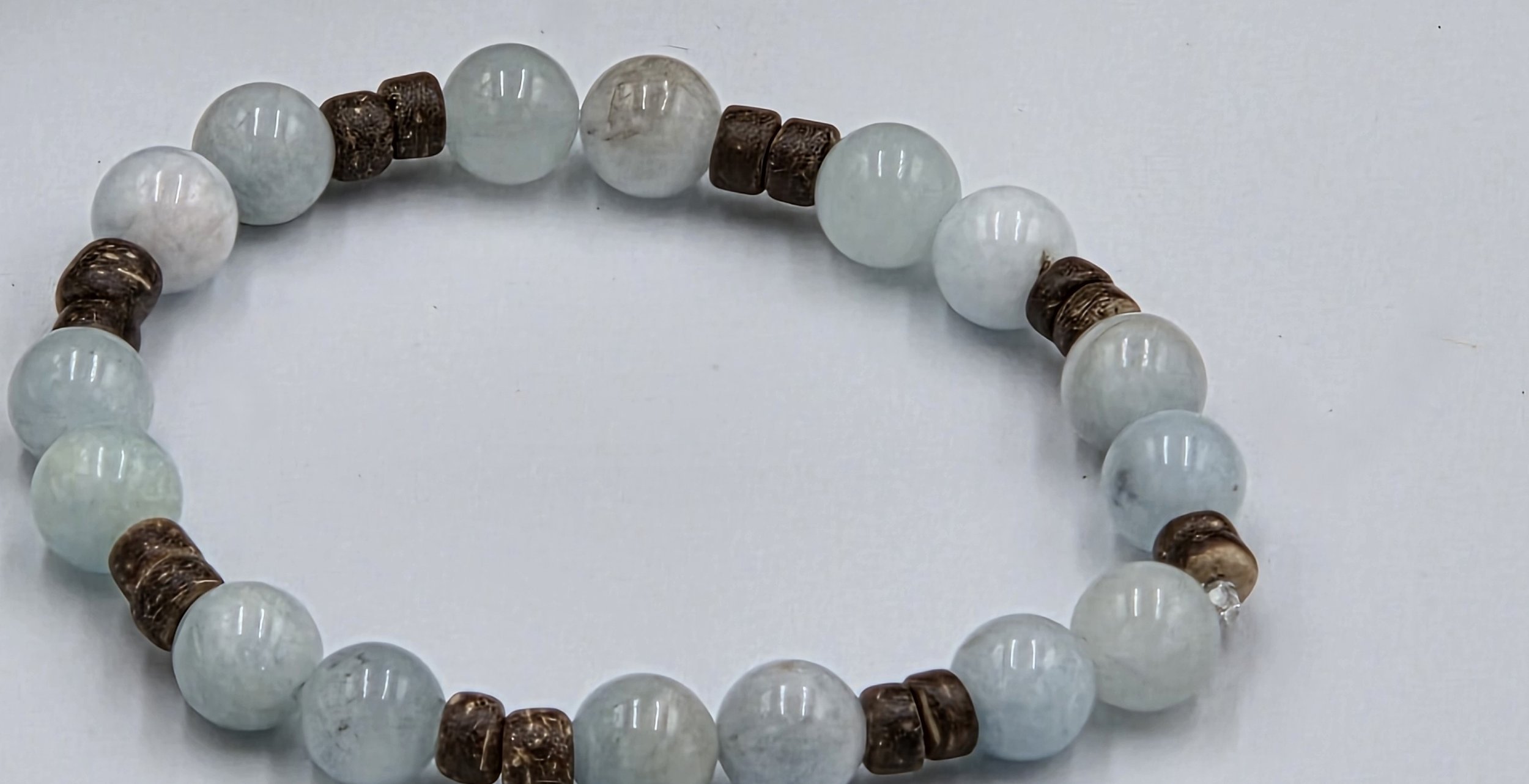OOAK premium aquamarine and fine coconut disc alternating elastic bracelet.