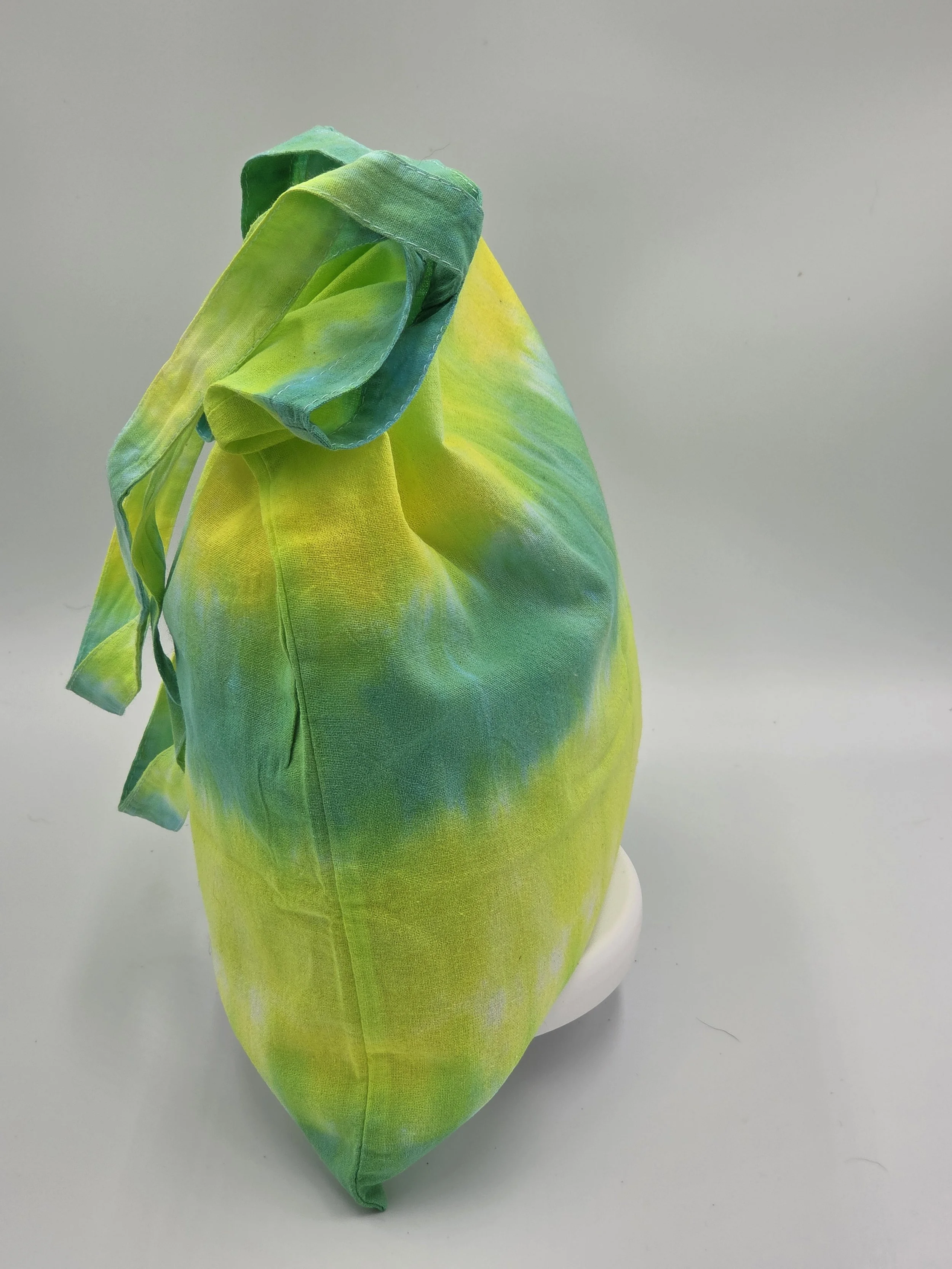Hand-dyed cotton tote bag with horizontal lime, green, and yellow stripes. OOAK textile art handmade in Canberra by Livity Studio.