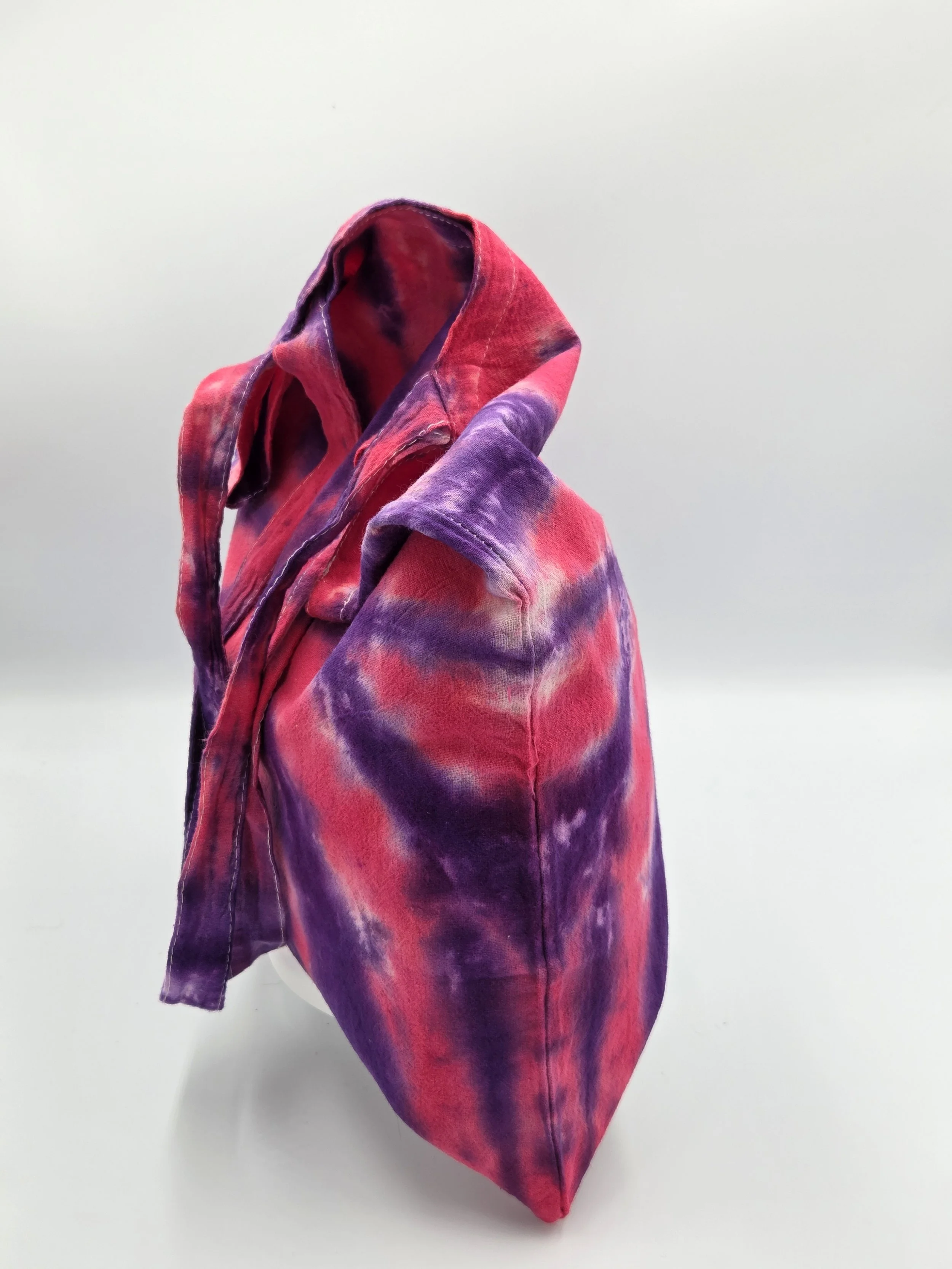 Hand-dyed cotton tote bag with a sharp purple and raspberry spider design. OOAK textile art handmade in Canberra by Livity Studio.