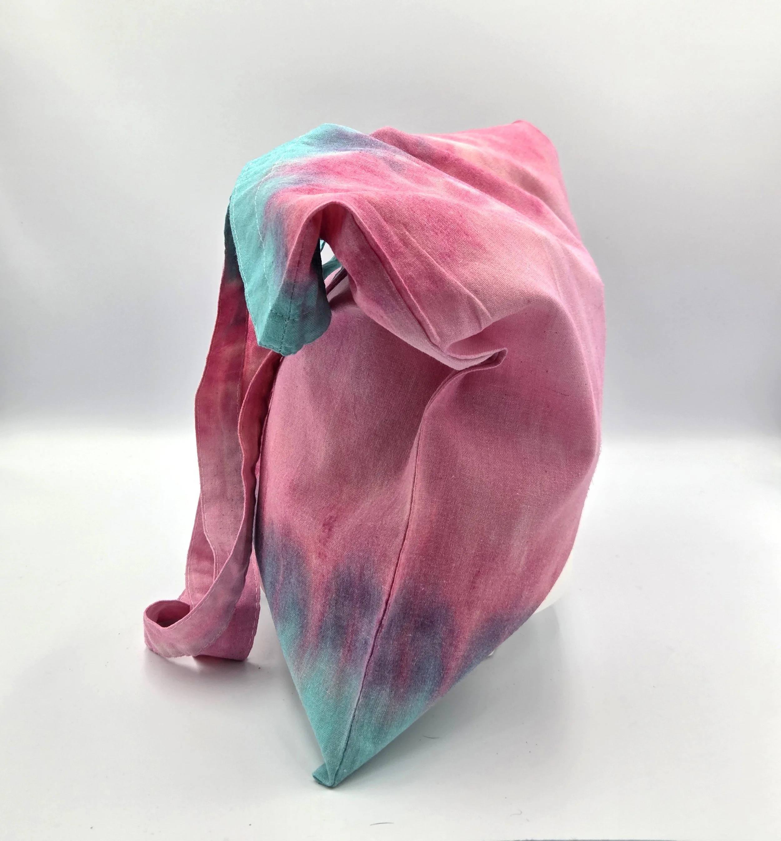 OOAK textile art tote bag with horizontal layers of soft green, dusky pink, and light pink. Hand-dyed natural cotton bag by Livity Studio.